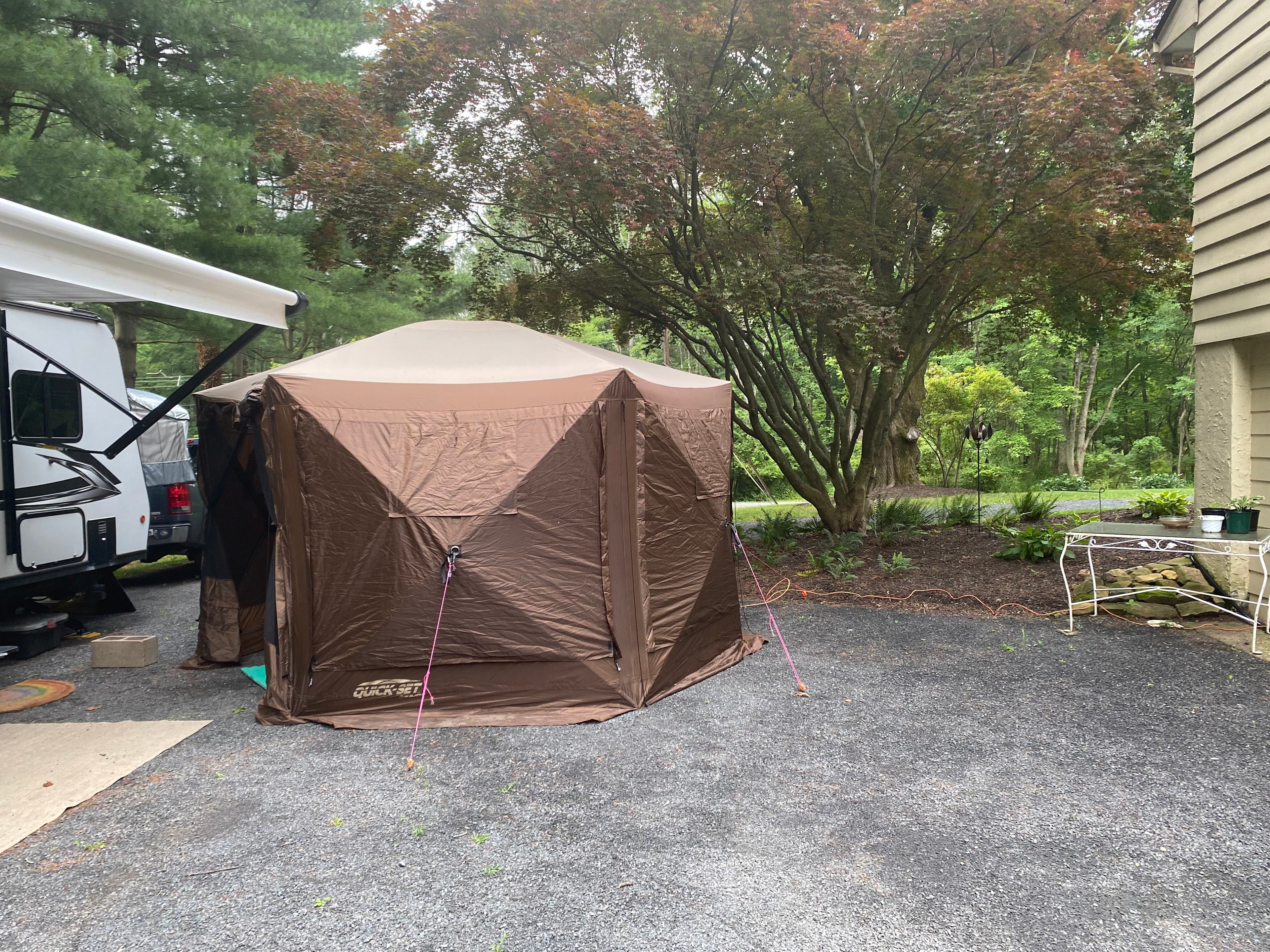 Optional Clam Shell Tent that can be set up as a Changing/Luggage Room for large parties OR as an outdoor/screened dining/relaxation space.
