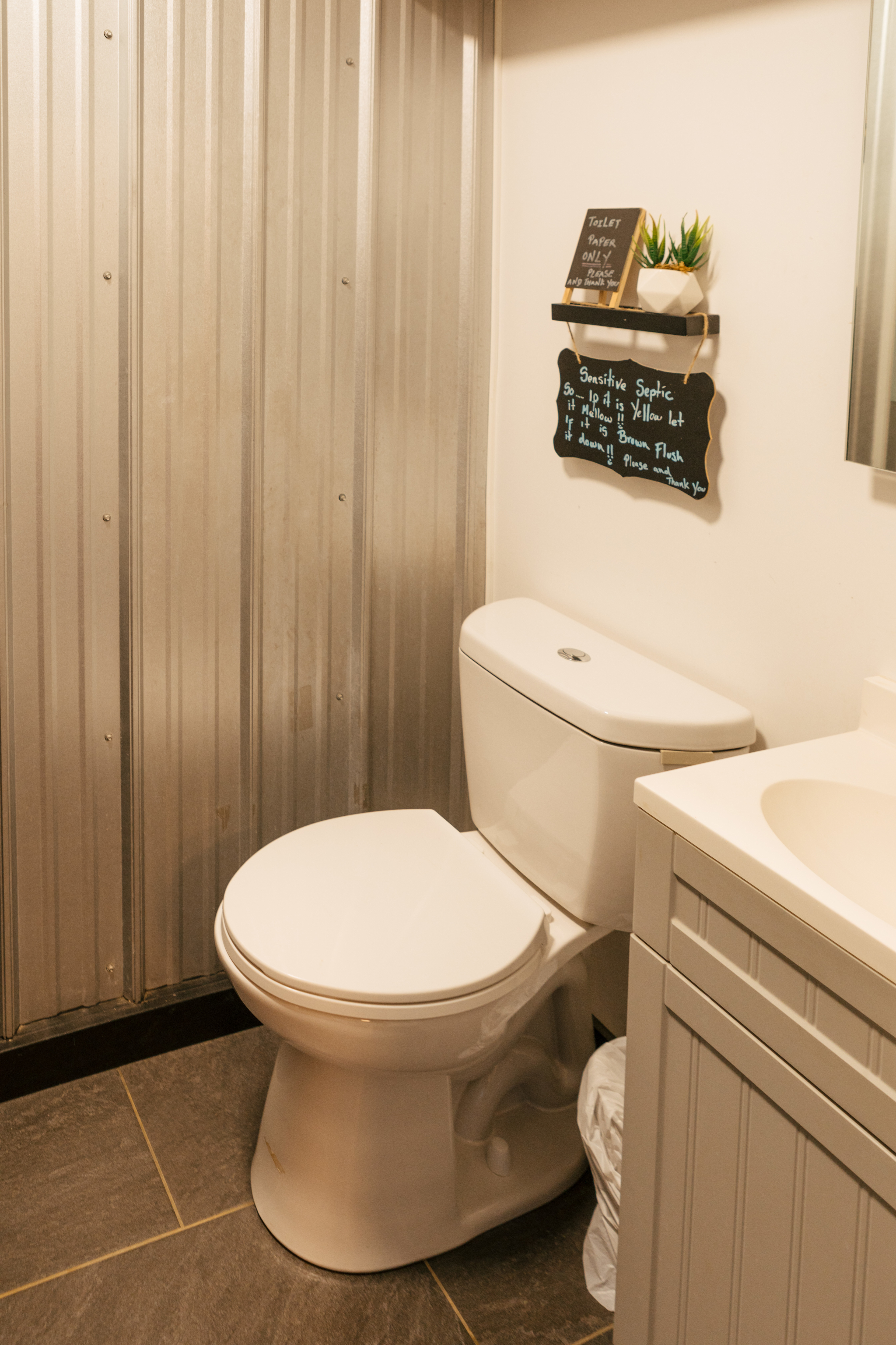 clean bathroom inside the shipping container
