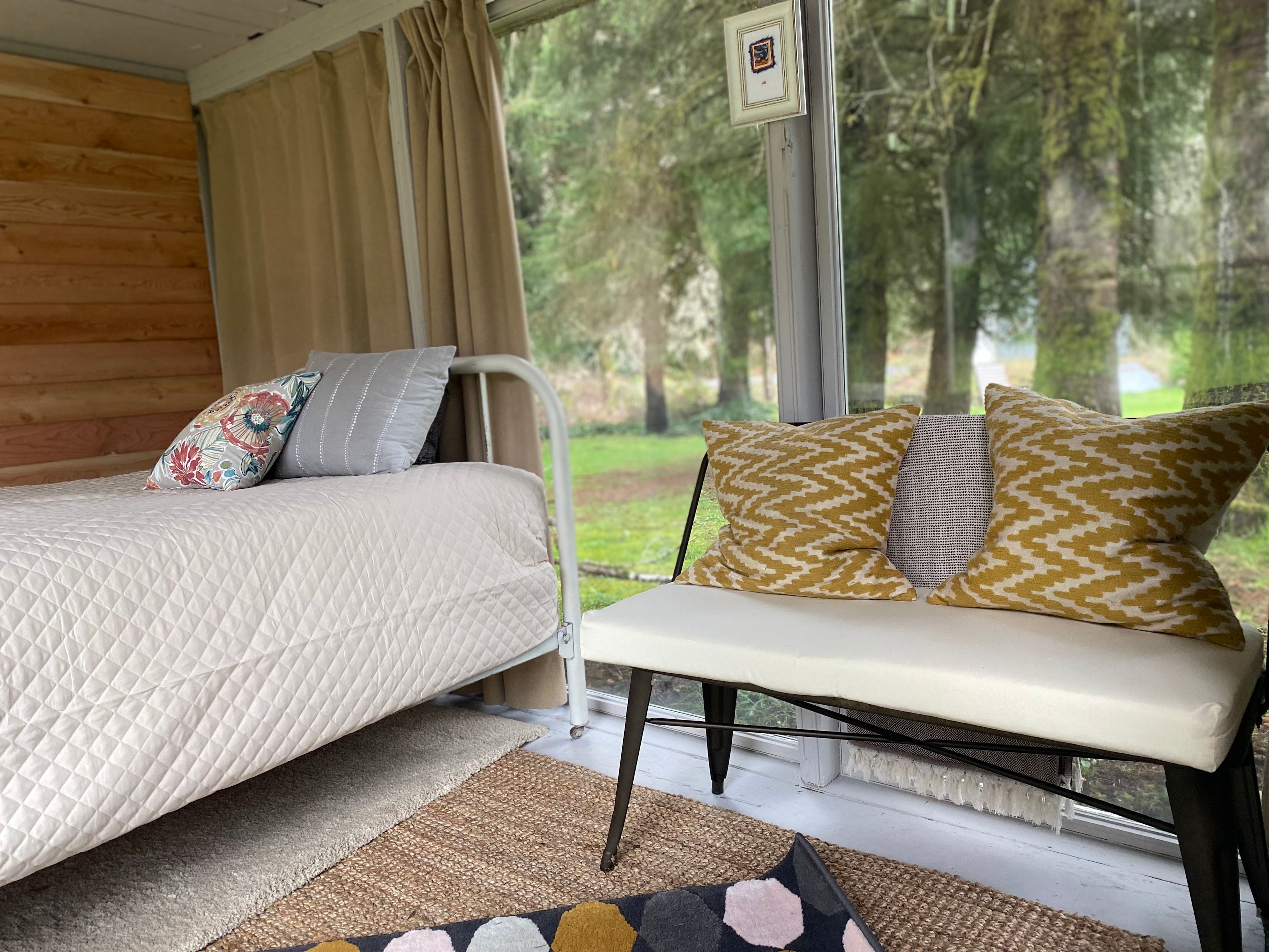 There is a bench, coatrack, and heater for chilly nights. 