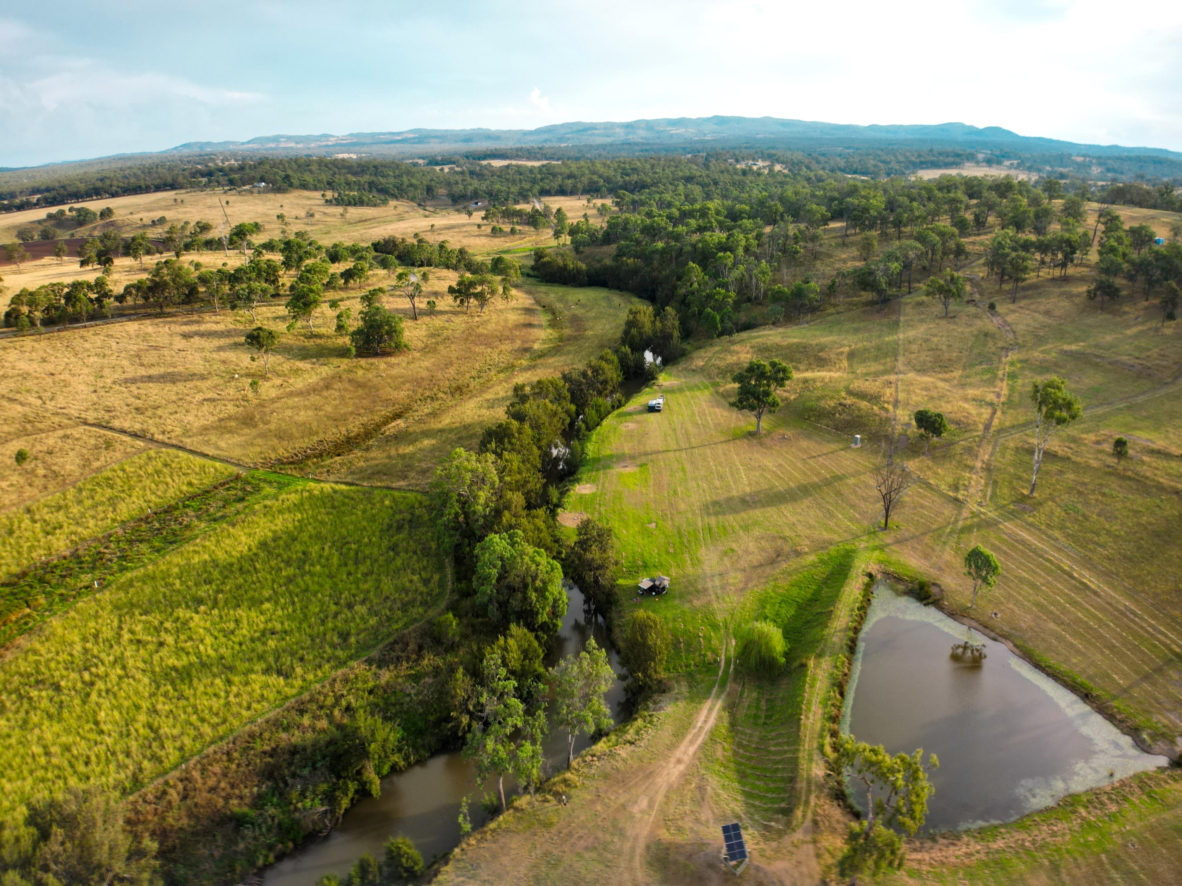 aerial view of the campsite and dam
