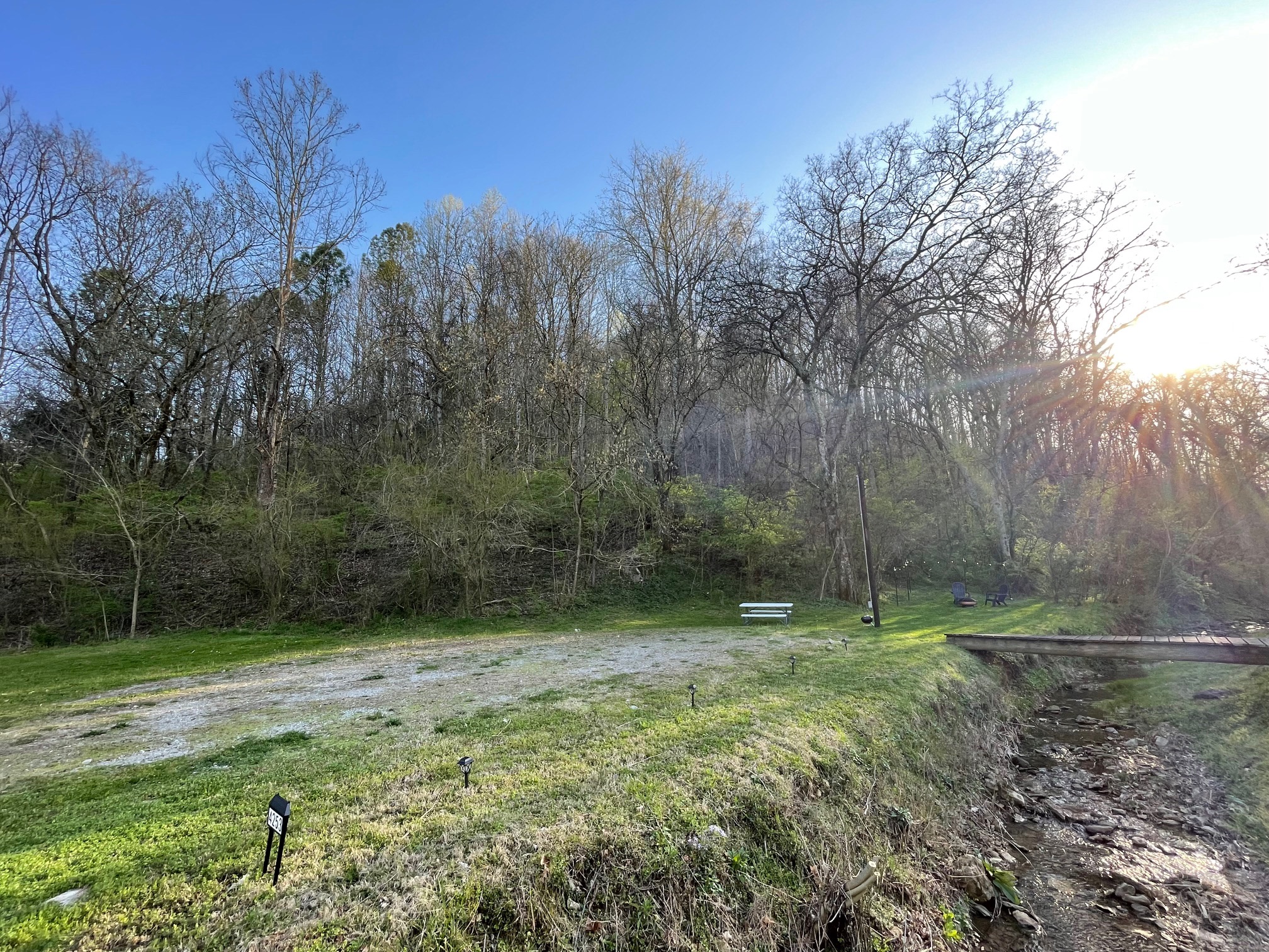 Your spot backs up to a beautiful wooded hill.