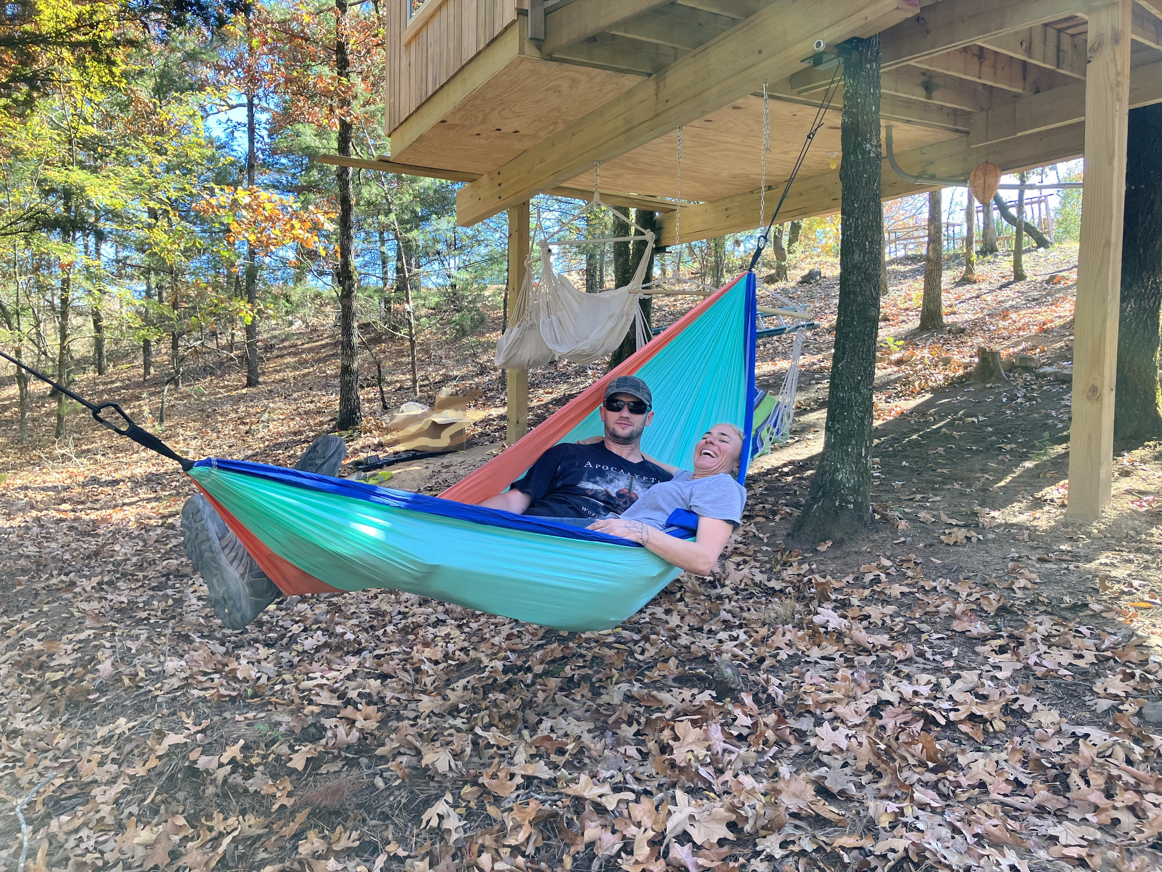 This hammock comes with a Tree House Stay.  It can hold 2 people up to 500 lbs.  Located under the tree house.  