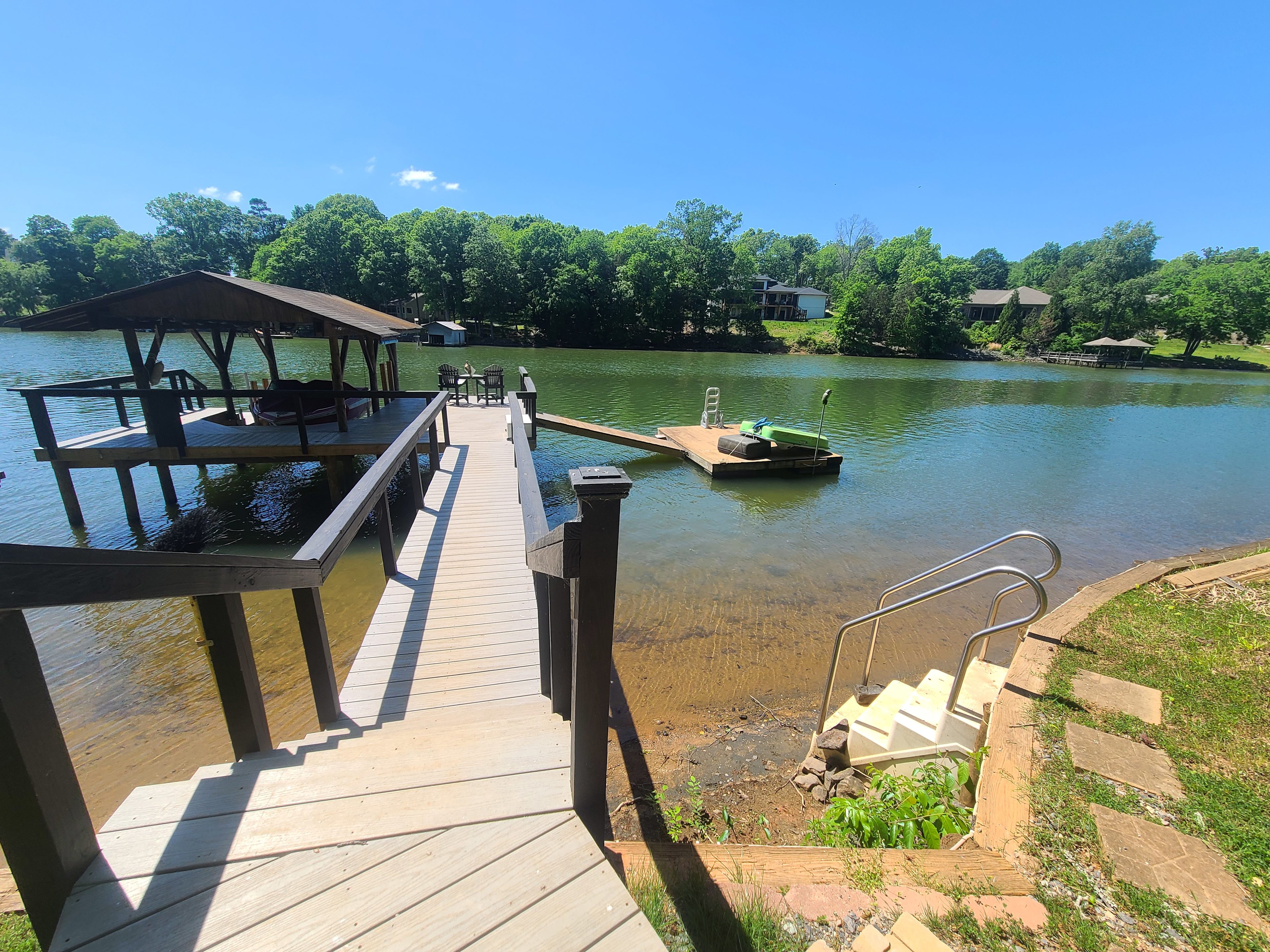 New spacious dock, floating dock with ladder, water access from retaining wall.