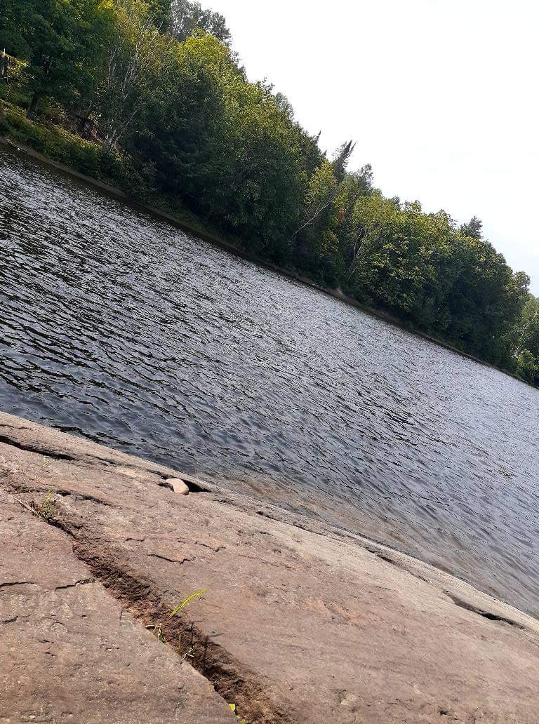 Water Rock, when water level lowers, your able to sit on dry rock, fish, or go into kyaks. 

NO SWIMMING 
IN RIVER, WHIRLPOOLS