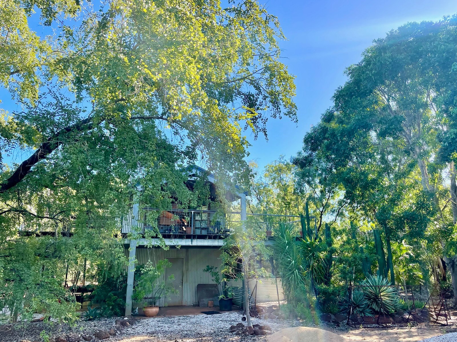 The is the main house lived in by the property owner. The camp site is located in a private section of the property away from the main house. 
