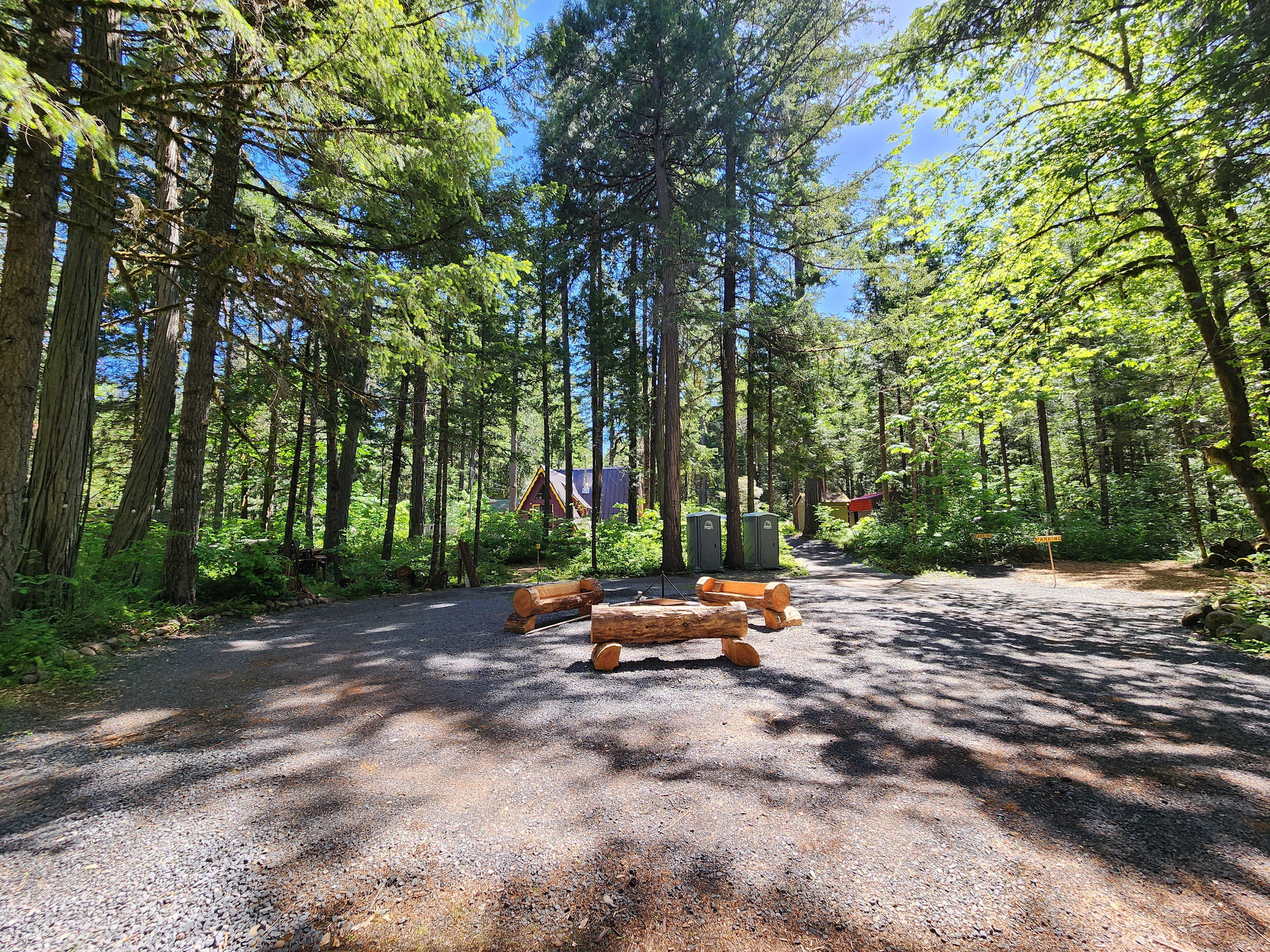 The heart of it all. The central gravel area with firepit and log benches. 
