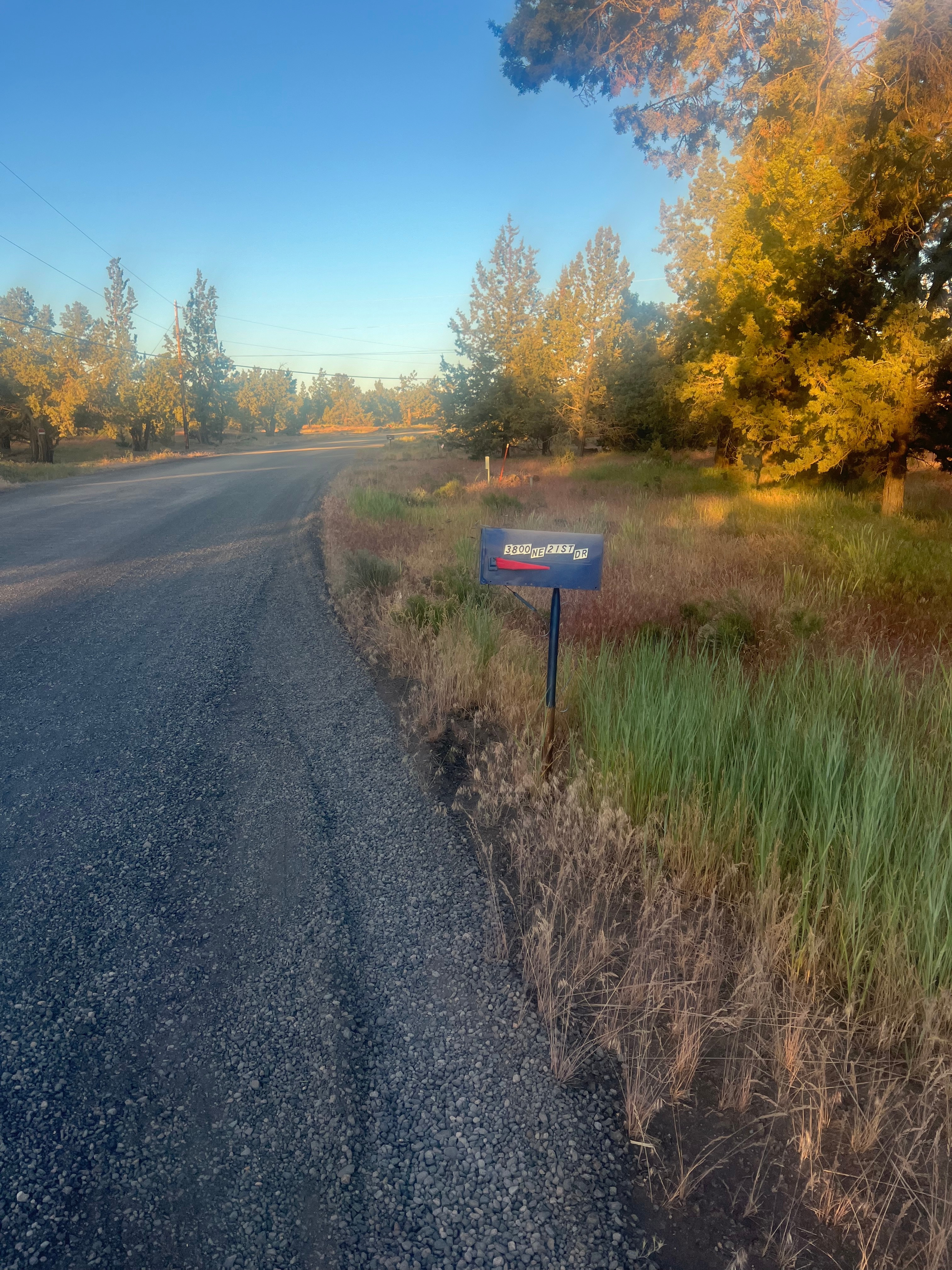 Mailbox located on the opposite side of the entrance.  