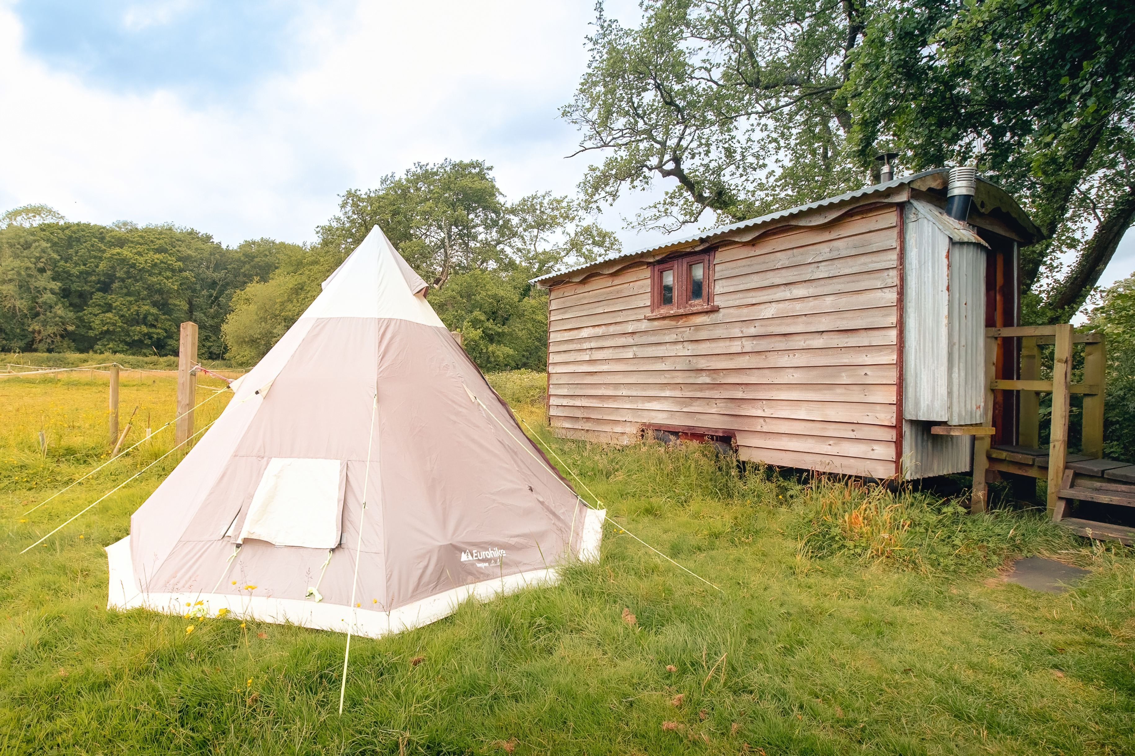 Hot water is heated by a LPG gas heater stored outside.