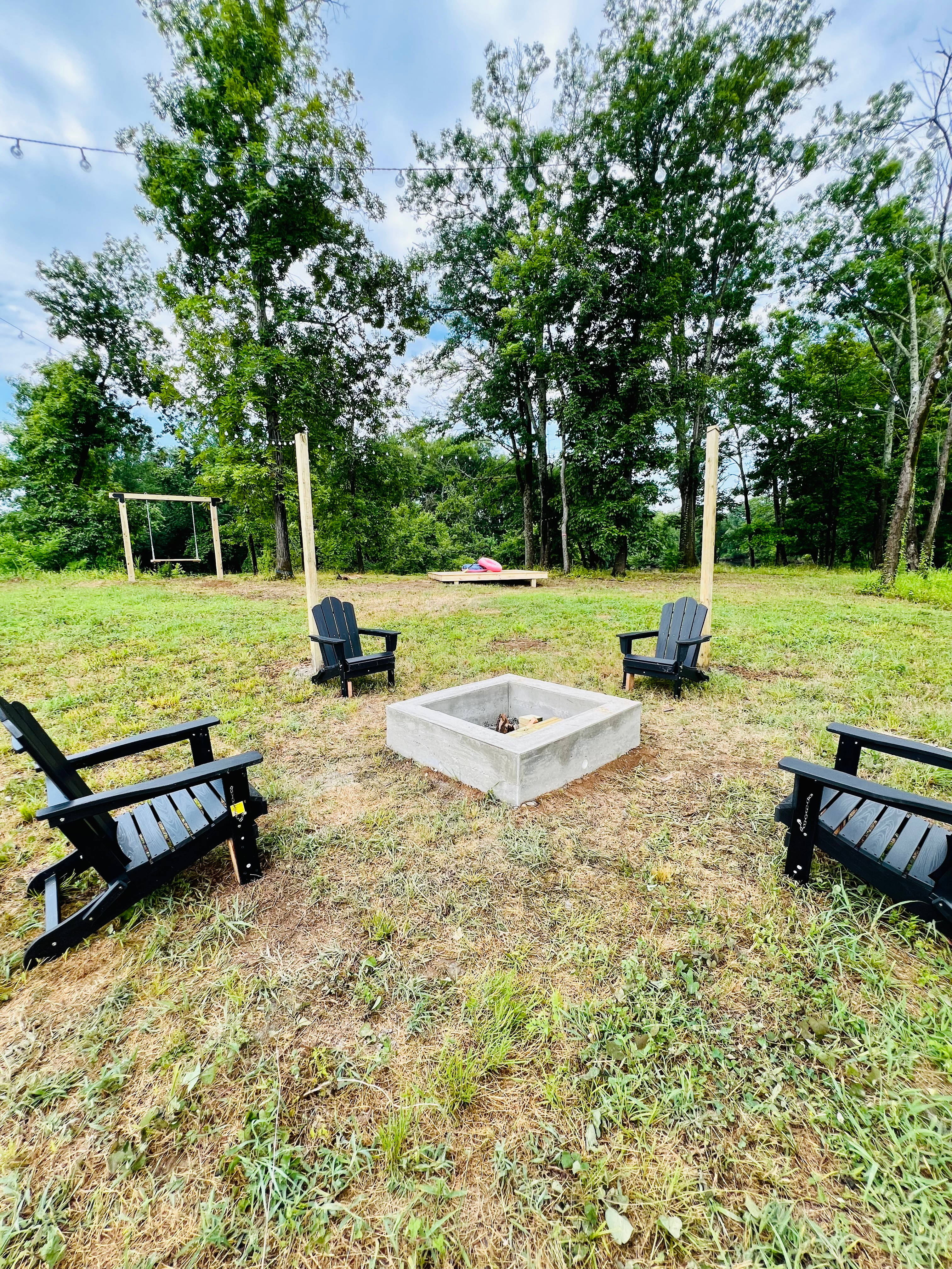 Firepit, twinkle lights, and secured seating