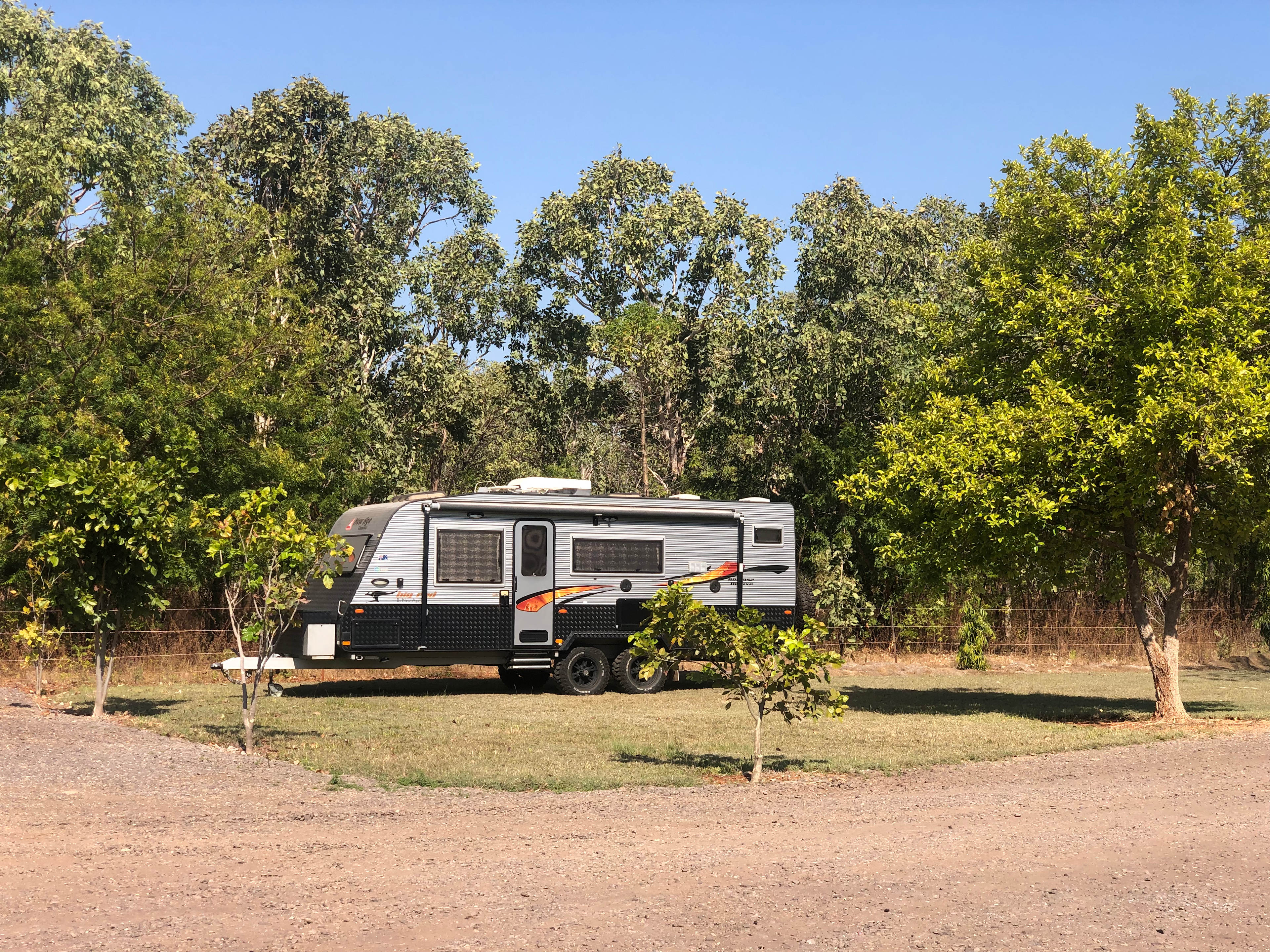 New Age Big Red available for hire on site. Air conditioned, queen size island bed, twin bunks & dining table conversion bed.