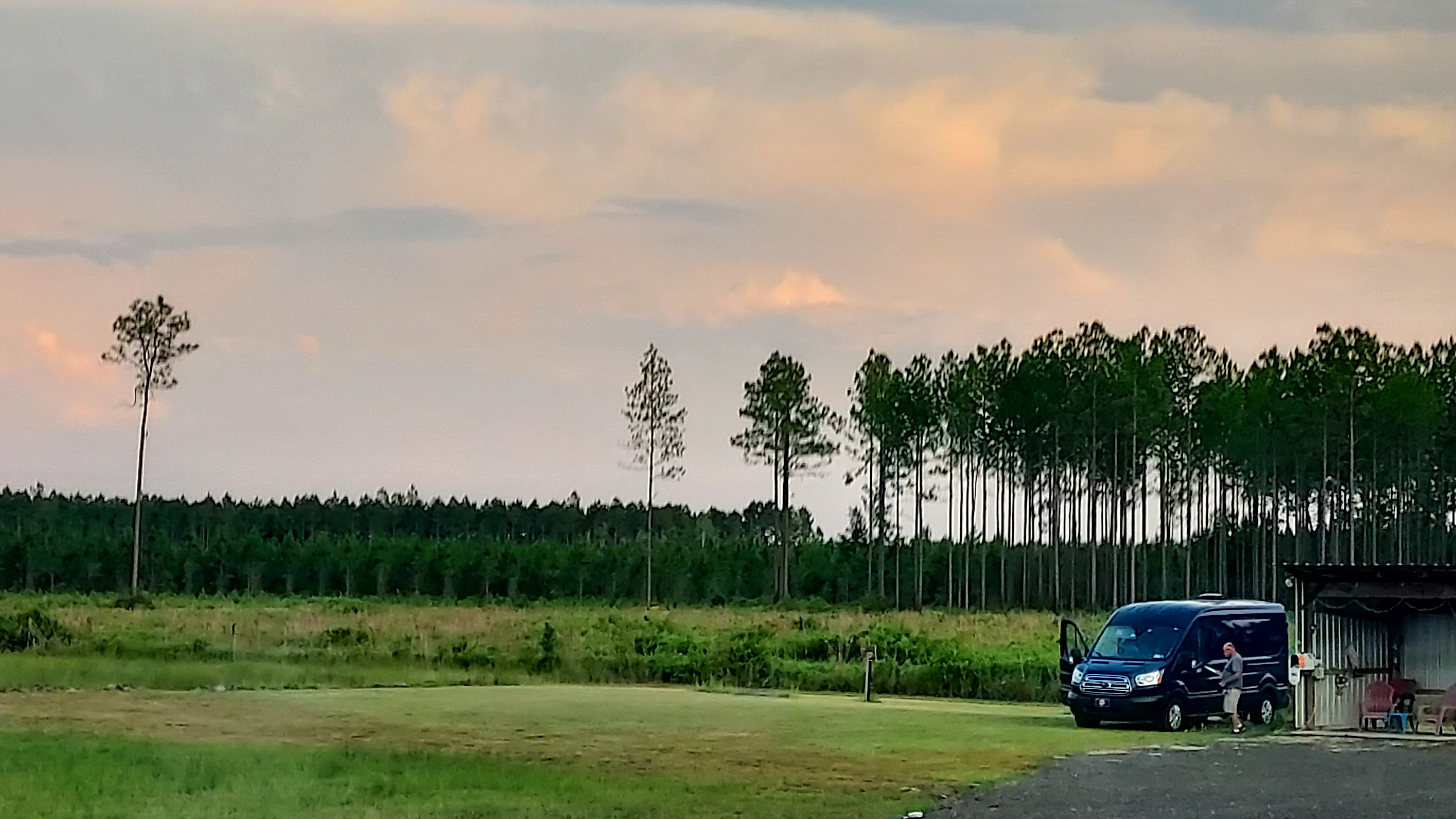 Left of the open shed is a water connection & 30 amp (only) plug in..