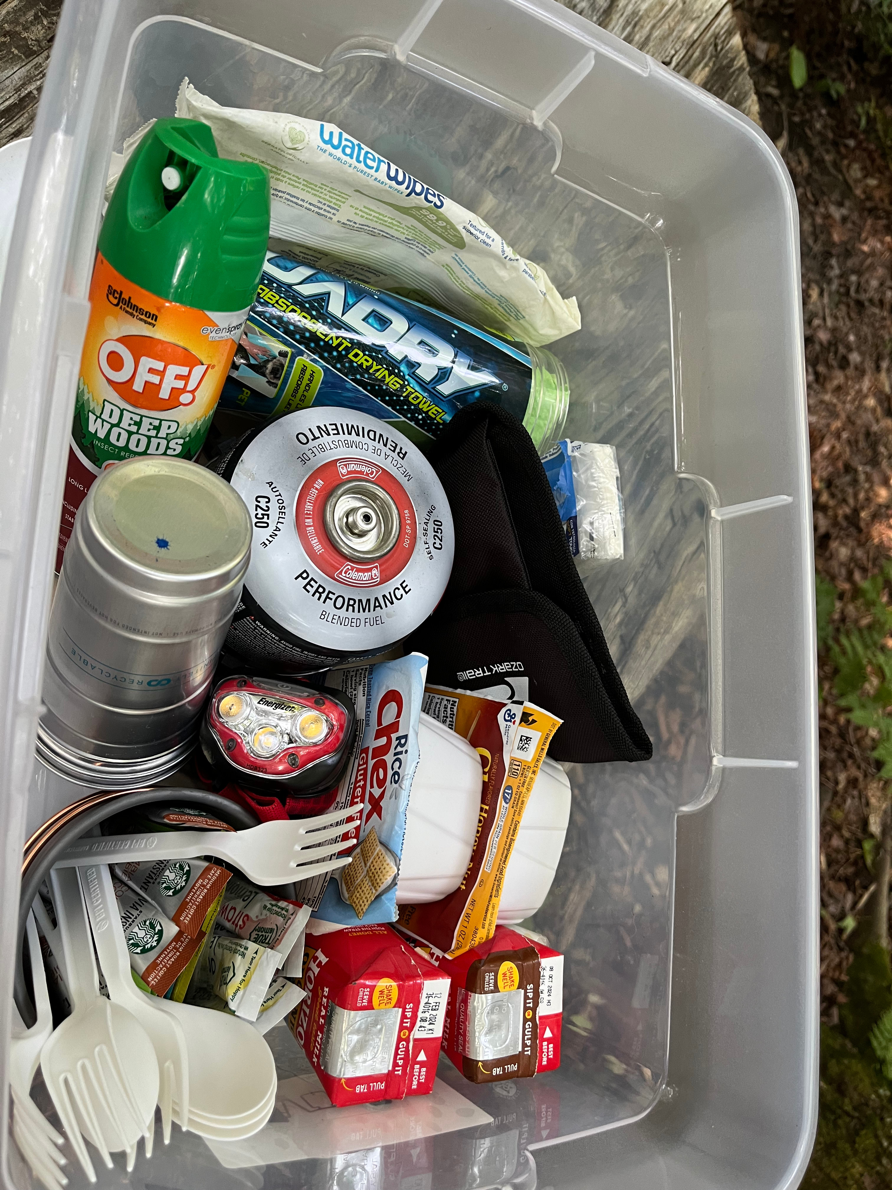 Camp essentials; first aid kit, bug spray, headlamp, towel, propane camp stove with 12 oz cup for boiling water or making food, coffee & teas, cups, plates, utensils, cereals & milk, tissues, wipes & trash bag all for your to use & left in shed or at campsite. 
