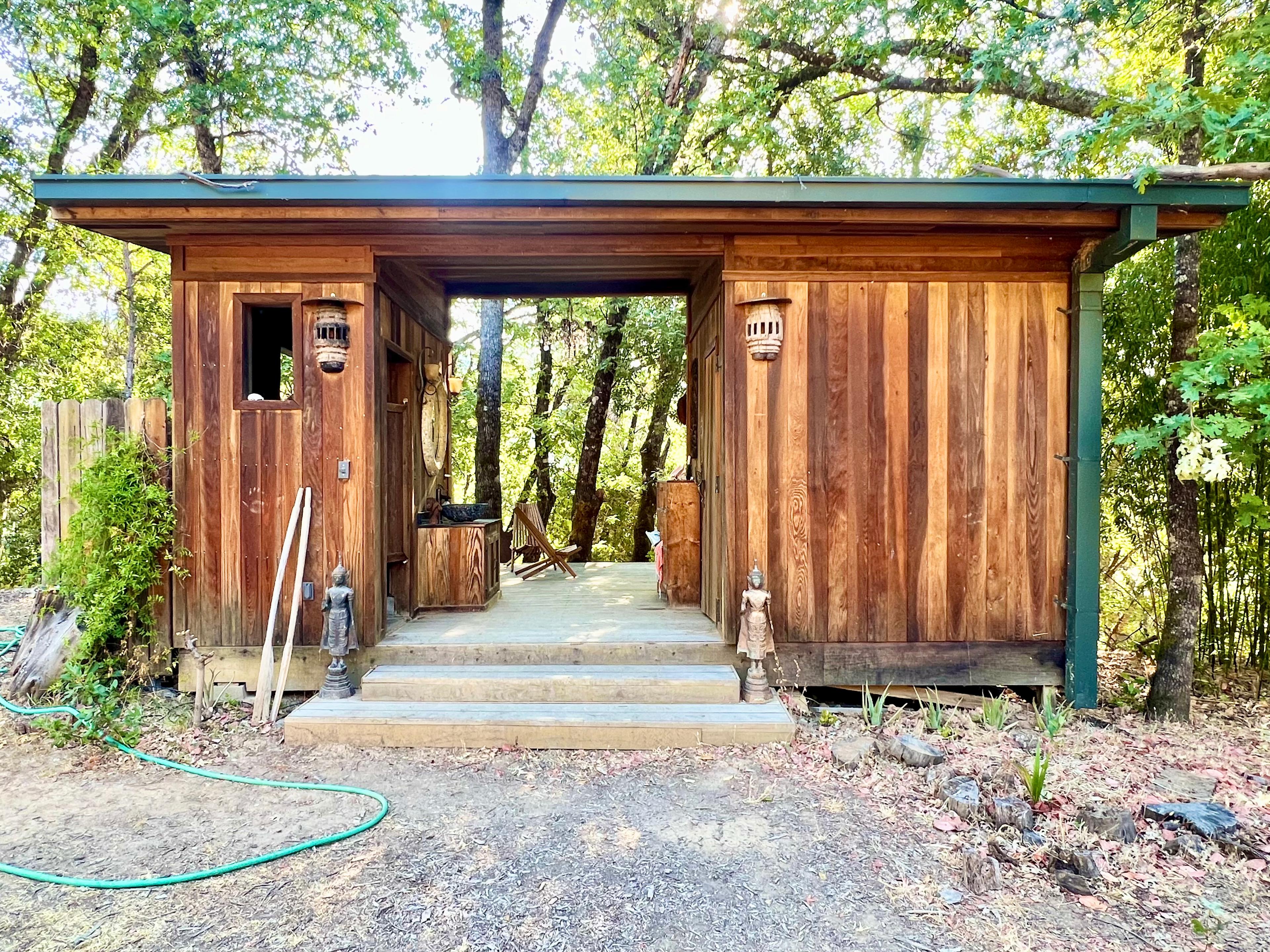 Sauna and hot shower by the pond