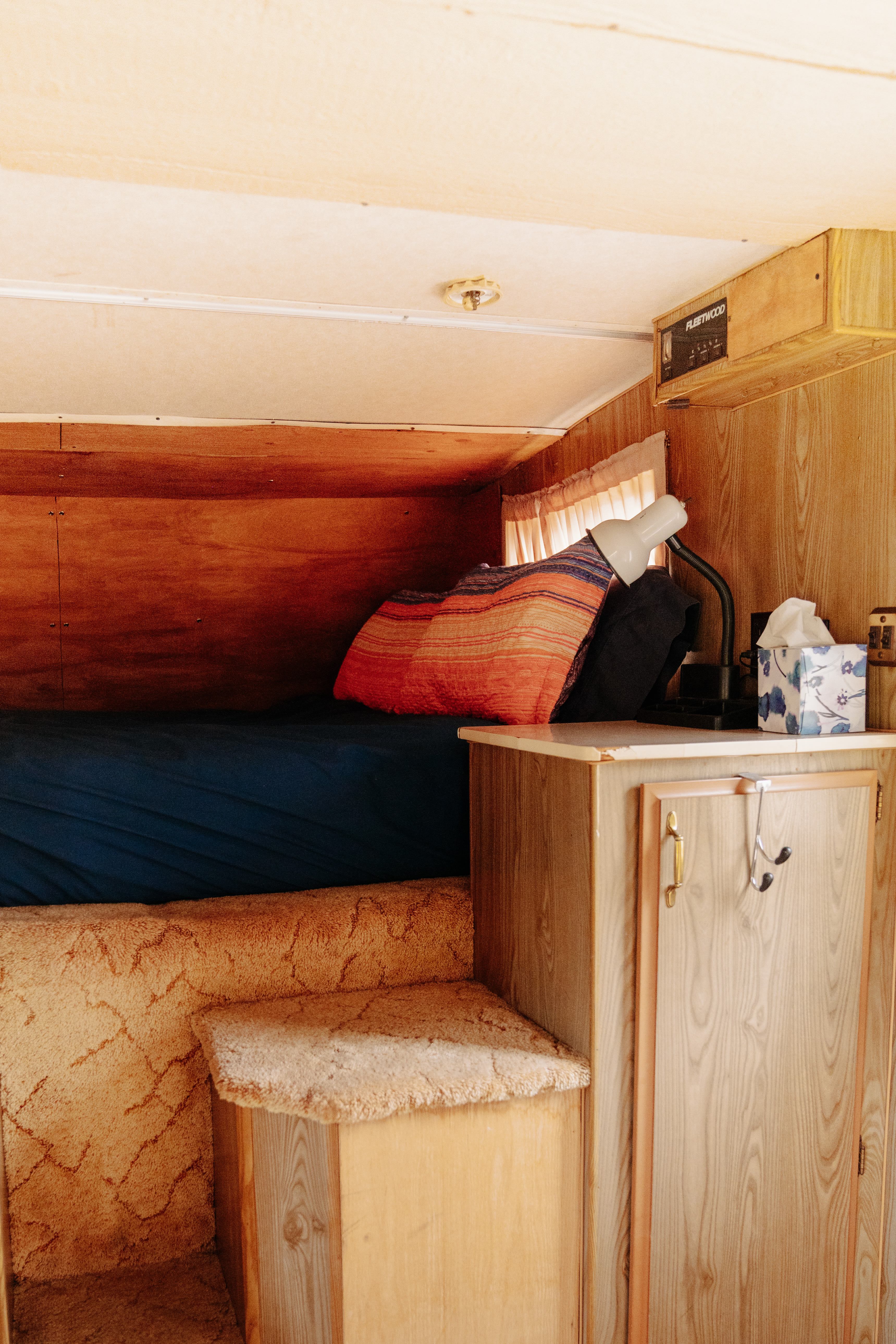 The cozy bed in the camper.