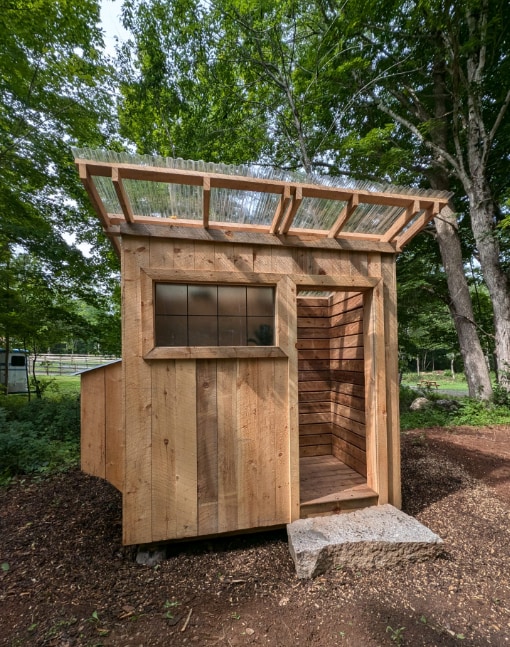 Outdoor shower 30 seconds away from your site. Enjoy a hot shower in the woods! 