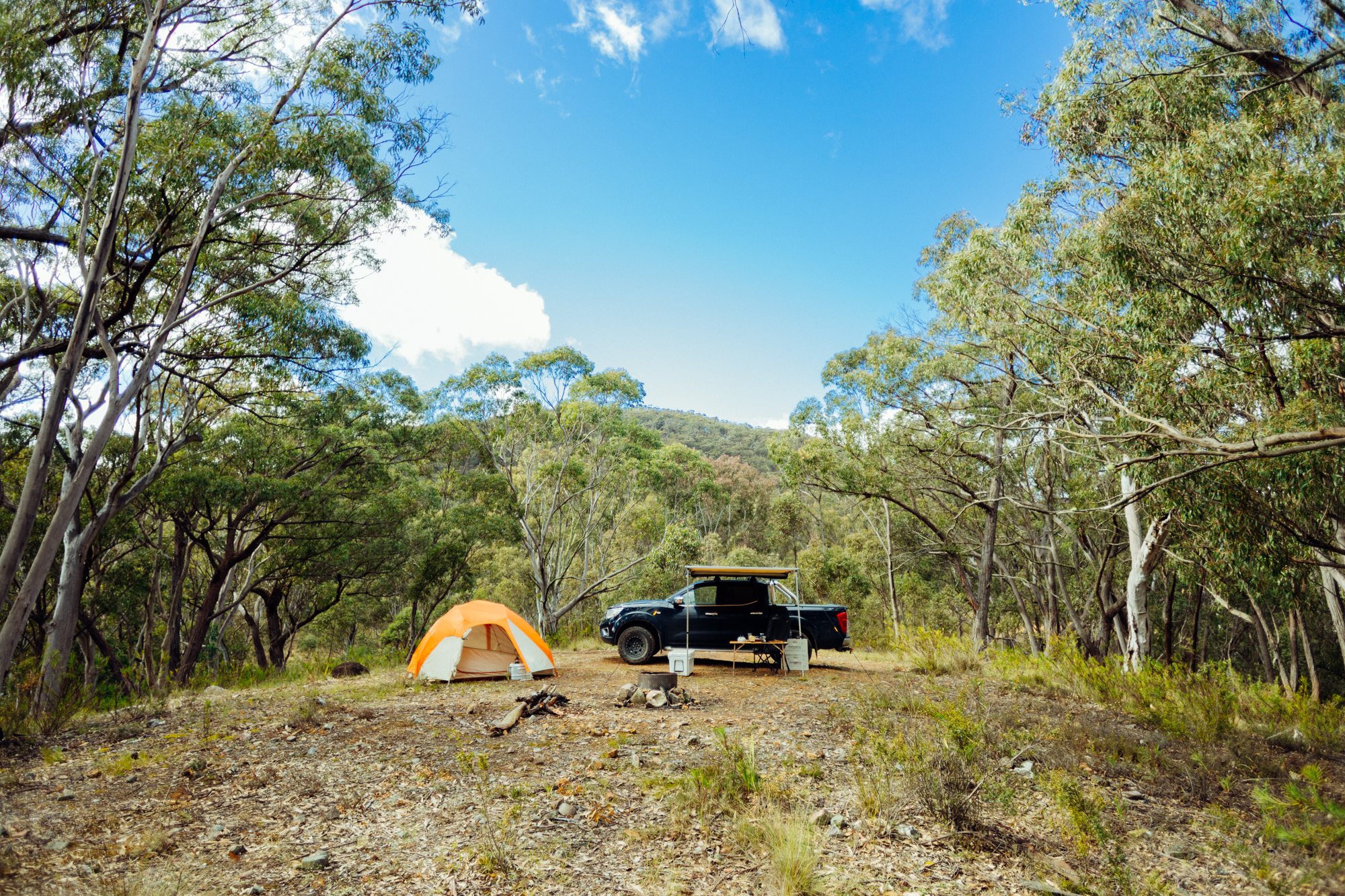 camp setup with mountain backdrop