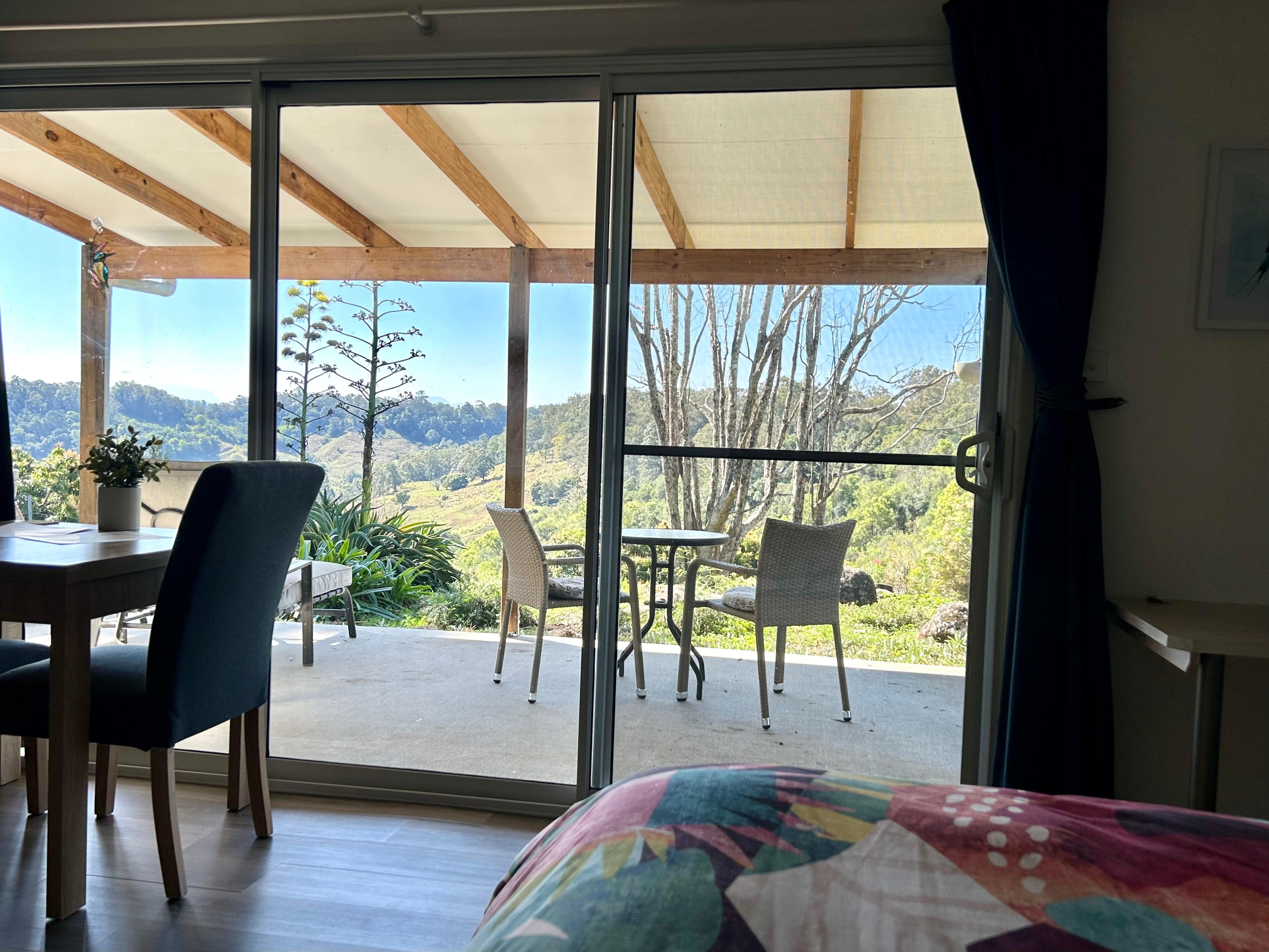 Wake up to these views! Watch for wallabies sneaking past the window through the garden.