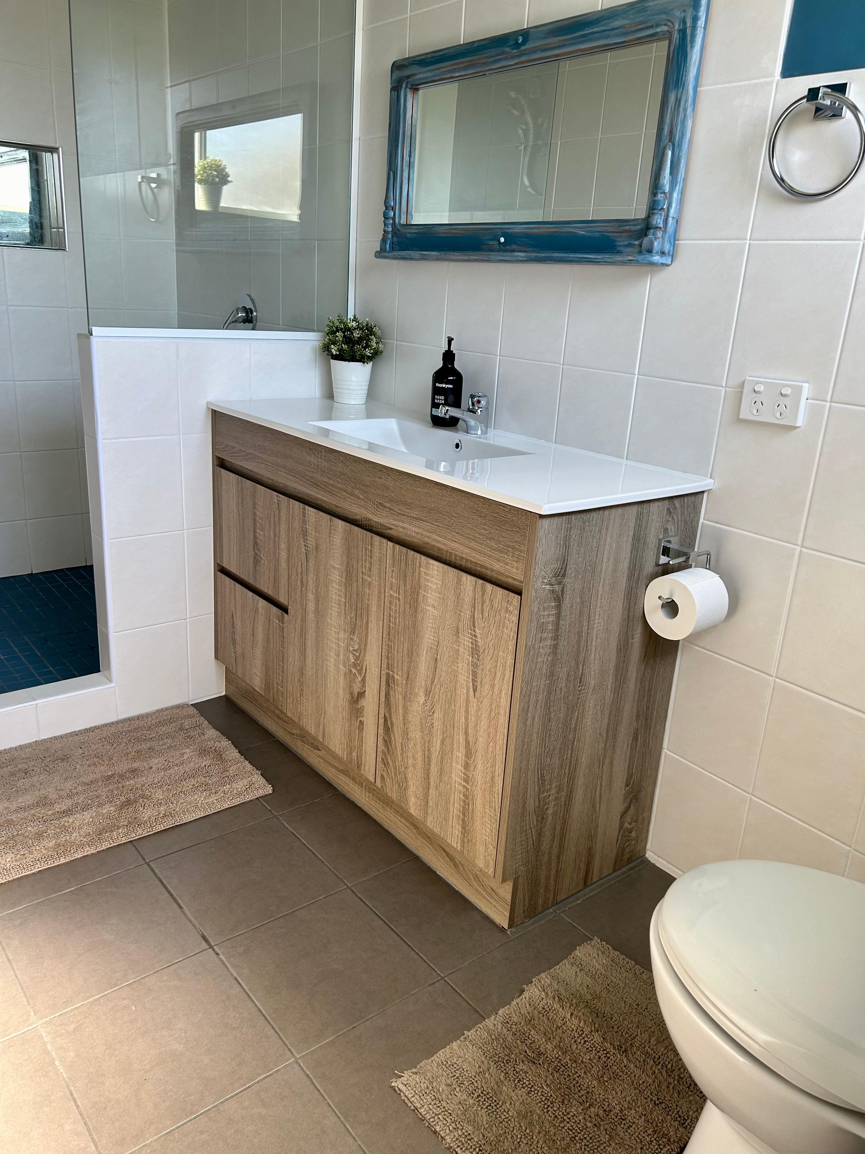 HUGE shower. Gas hot water. Unfiltered rainwater. Septic system loo.