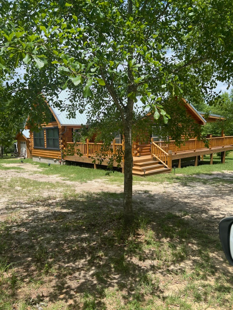 Elegant Log Cabin Creekside