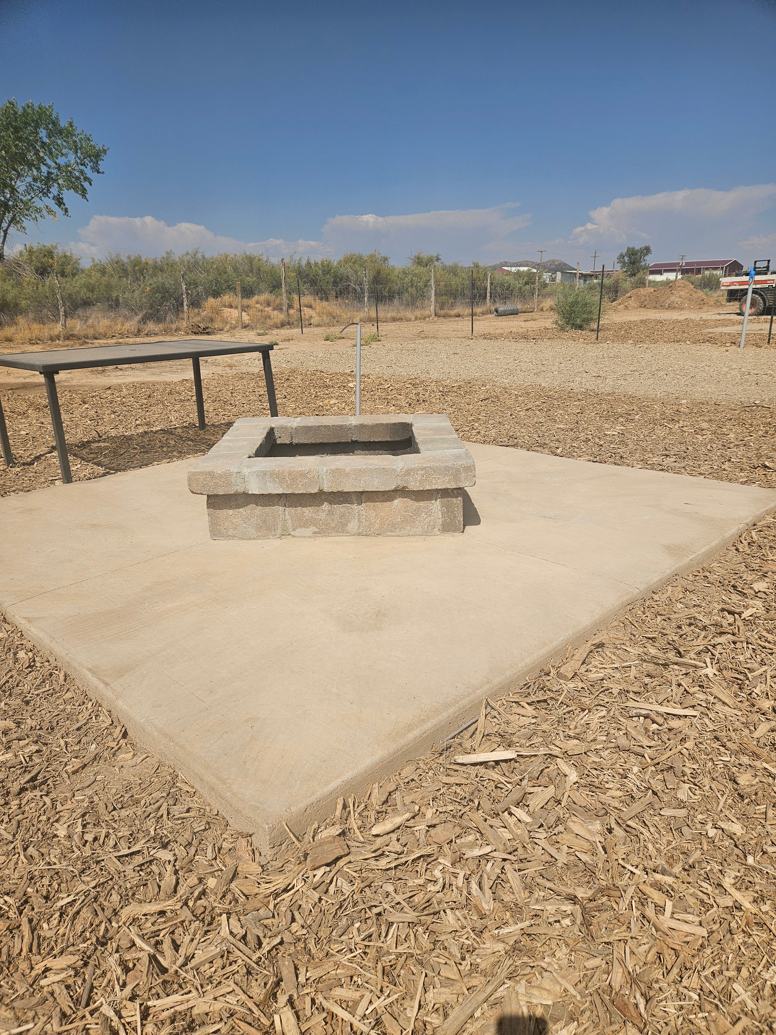 Each site has it's own fire pit with places to sit and relax around the fire.