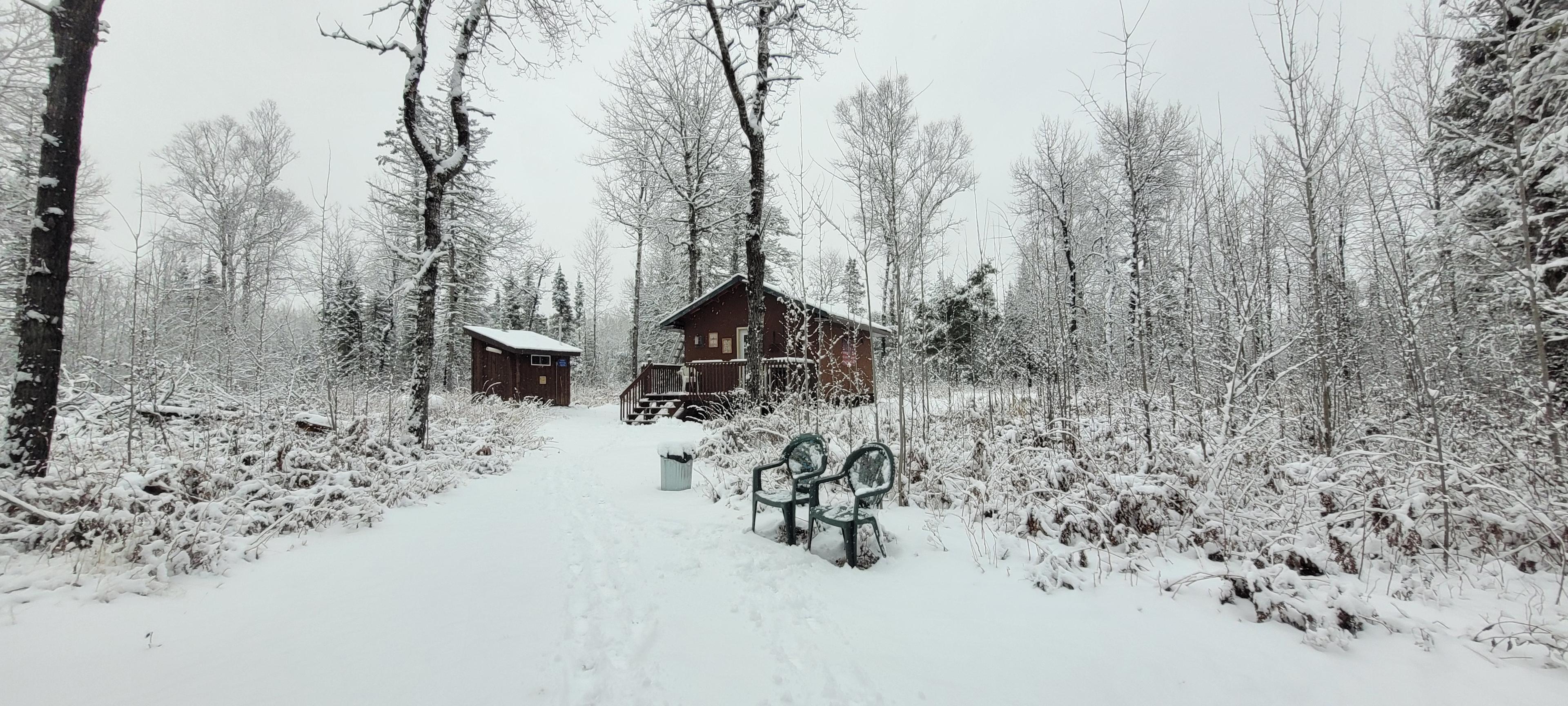 Back of cabin and outhouse.