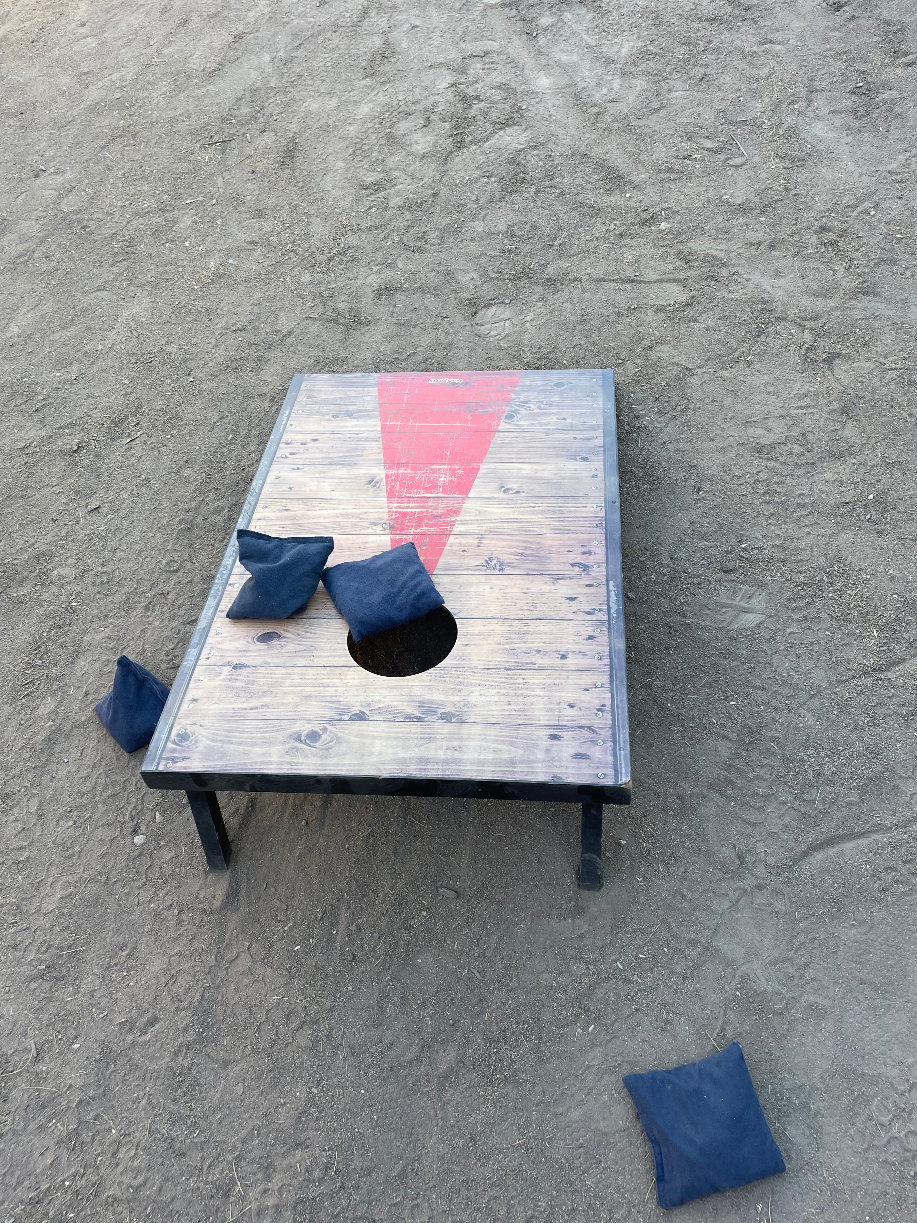 Cornhole will be made available to guests.  There are two boards and another set of red bean bags.