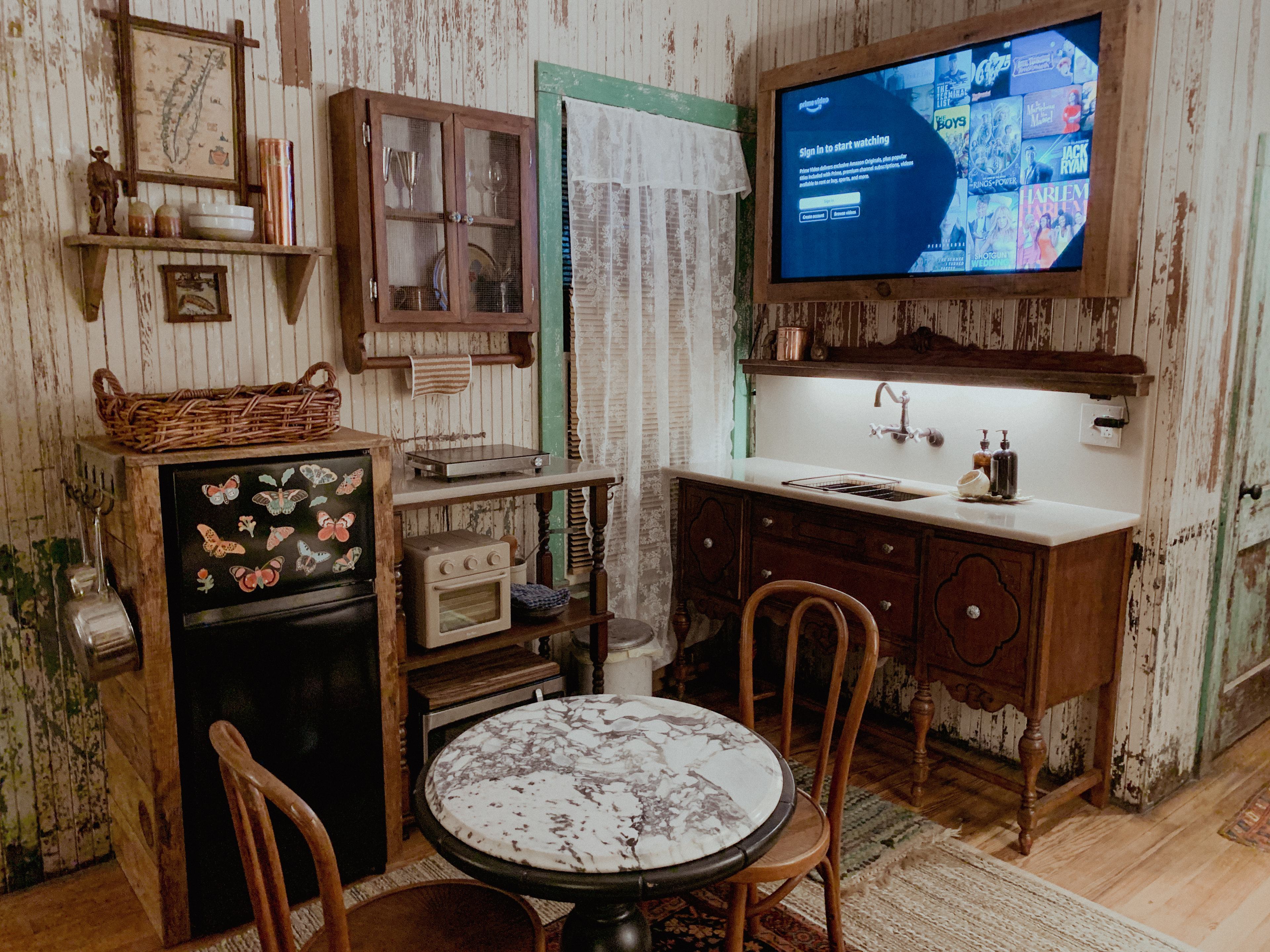 Kitchenette has fridge, coffee pot, electric kettle, induction 2 burner stovetop, microwave, and multi-oven that includes toaster oven, air fryer, broiler, convection oven all in one. 