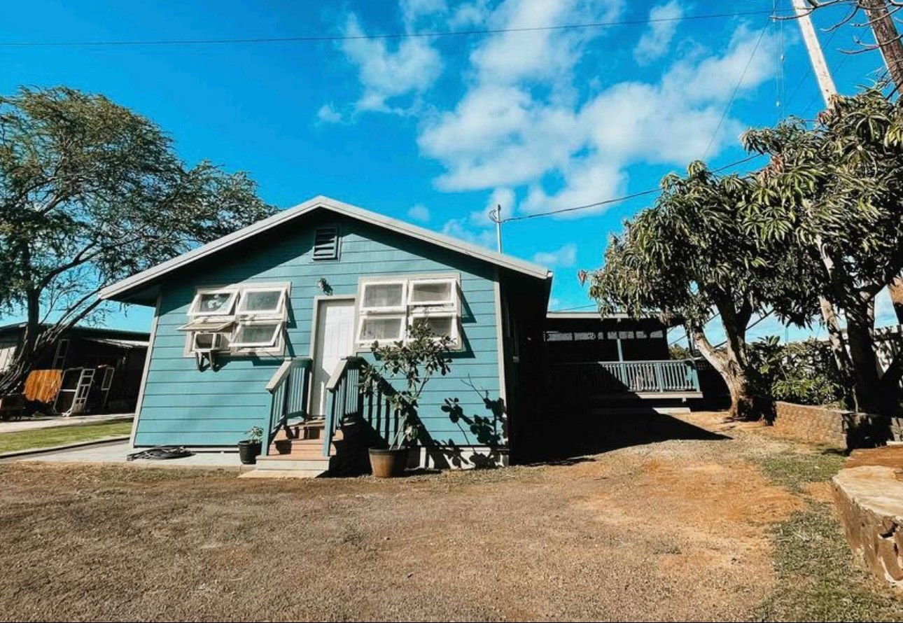 Home is on the right as you pull up the driveway into the gate from the main road