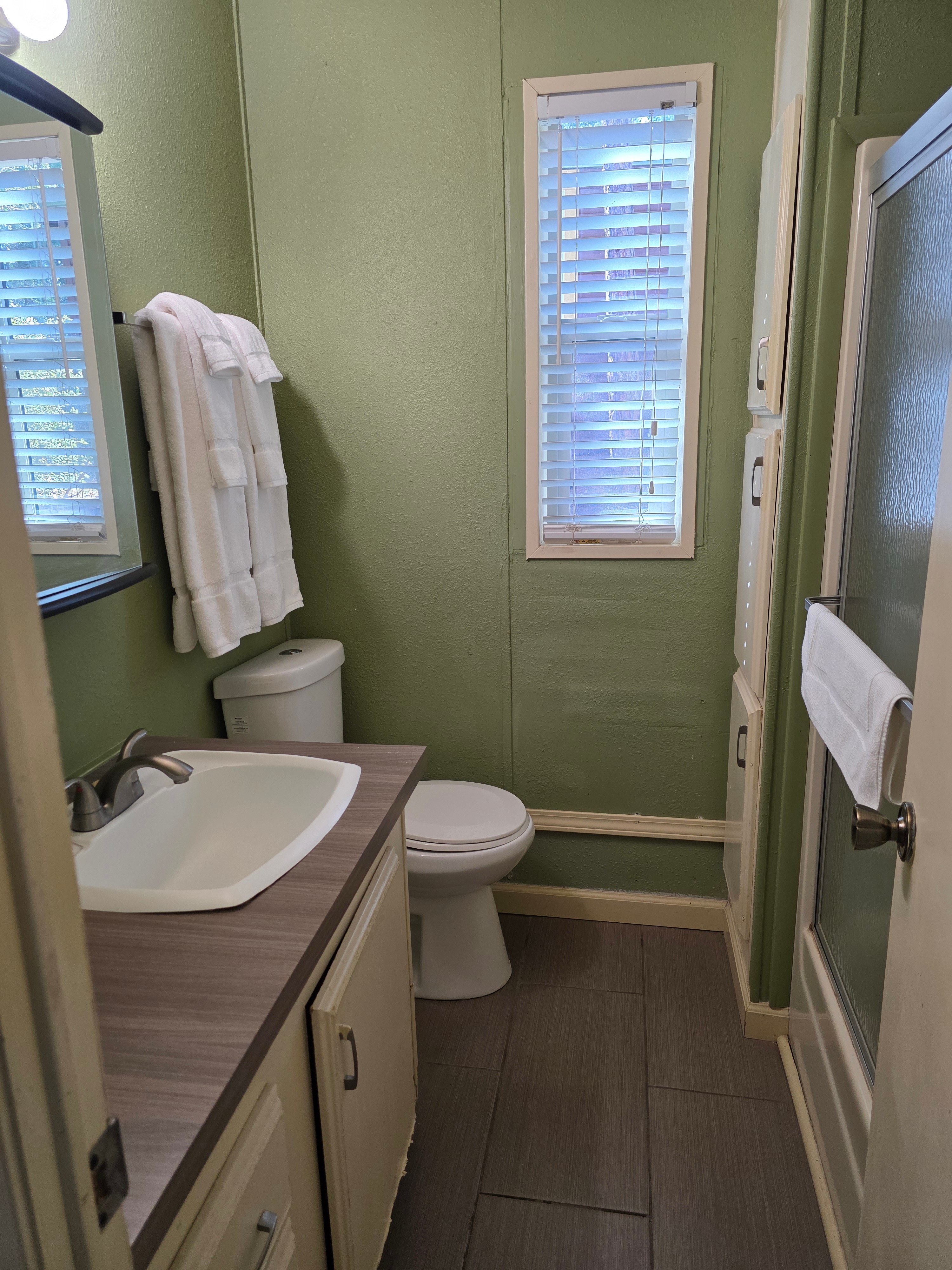 Bathrooms are stocked with towels, shampoo, conditioner, bodywash, & soap!