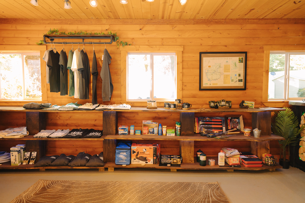 Rustic Acres Camp Store — stocked with essentials, snacks, firewood, and camping supplies for family and RV campers.