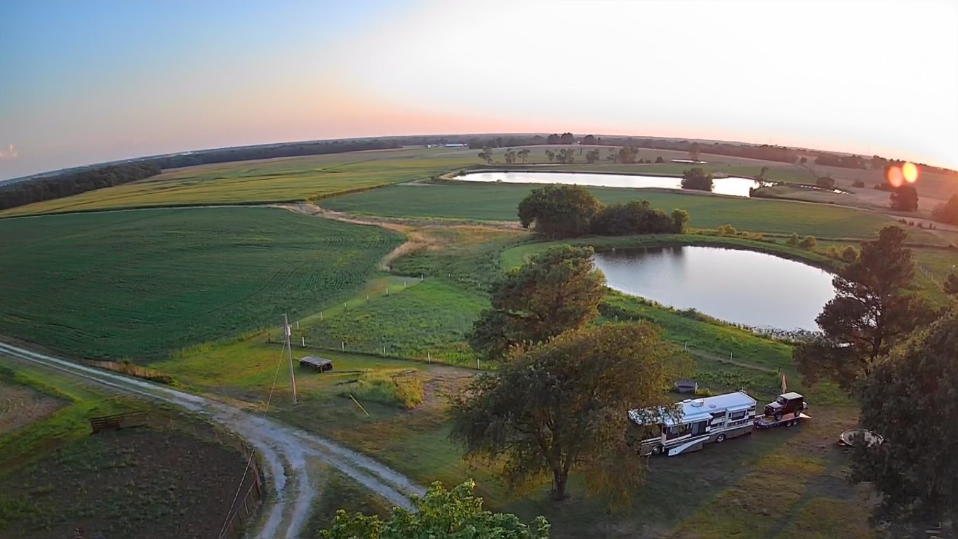 Aerial view of Farmland Panoramic from directly over the house. Choice of 4 spaces for parking.
