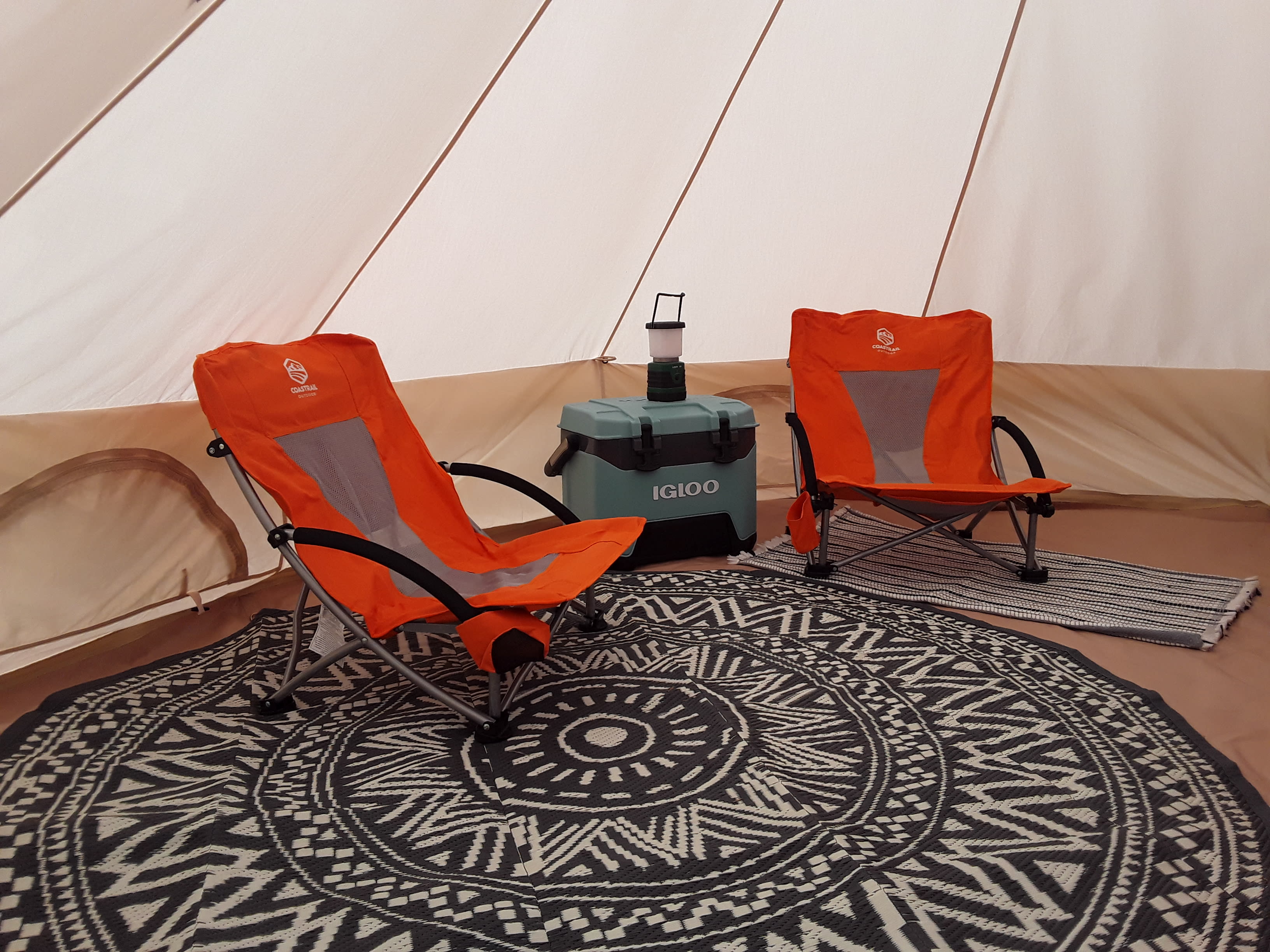 Sitting area and cooler in Mauna Kea tent