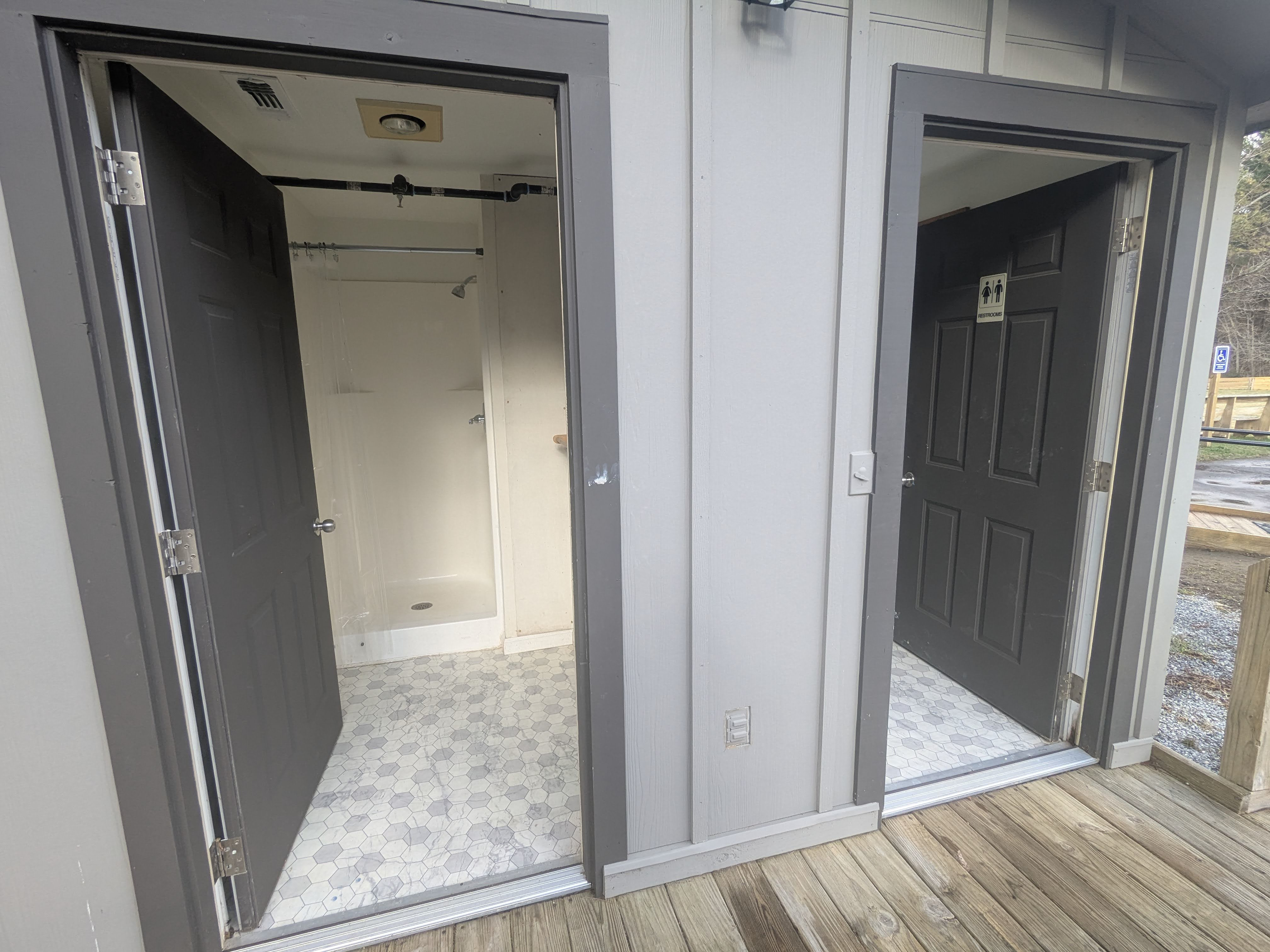Indoor shower and bathroom are available 24/7 - located across the field from the camp site.