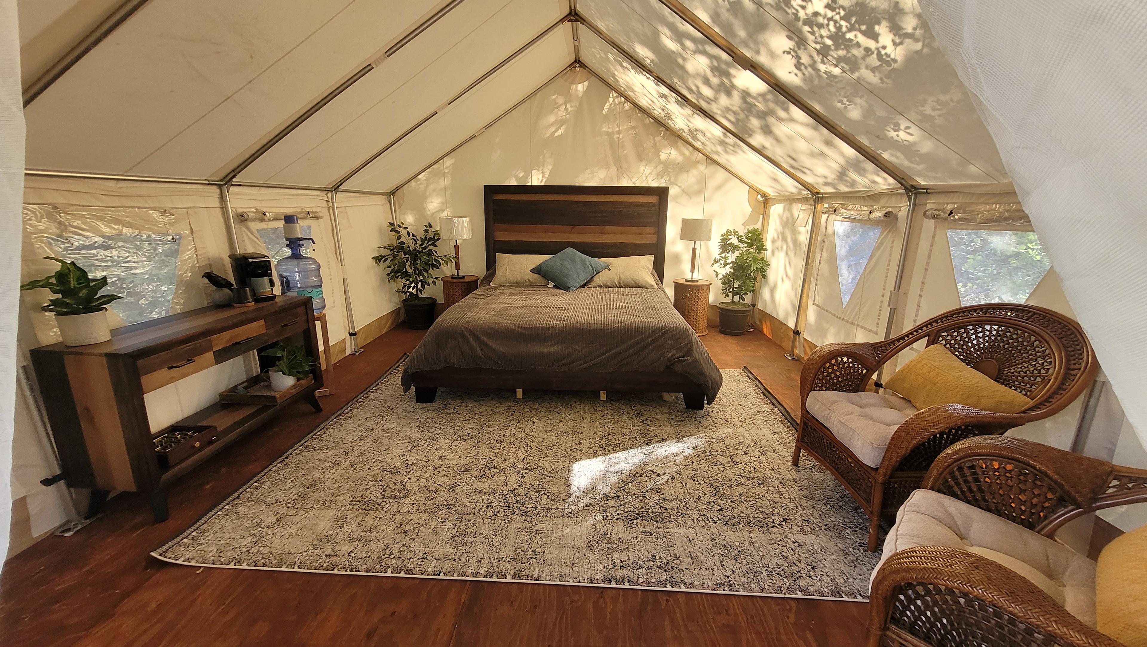 Interior of tent- Super comfortable King bed with cooling mattress for summer and electric blanket for winter. 