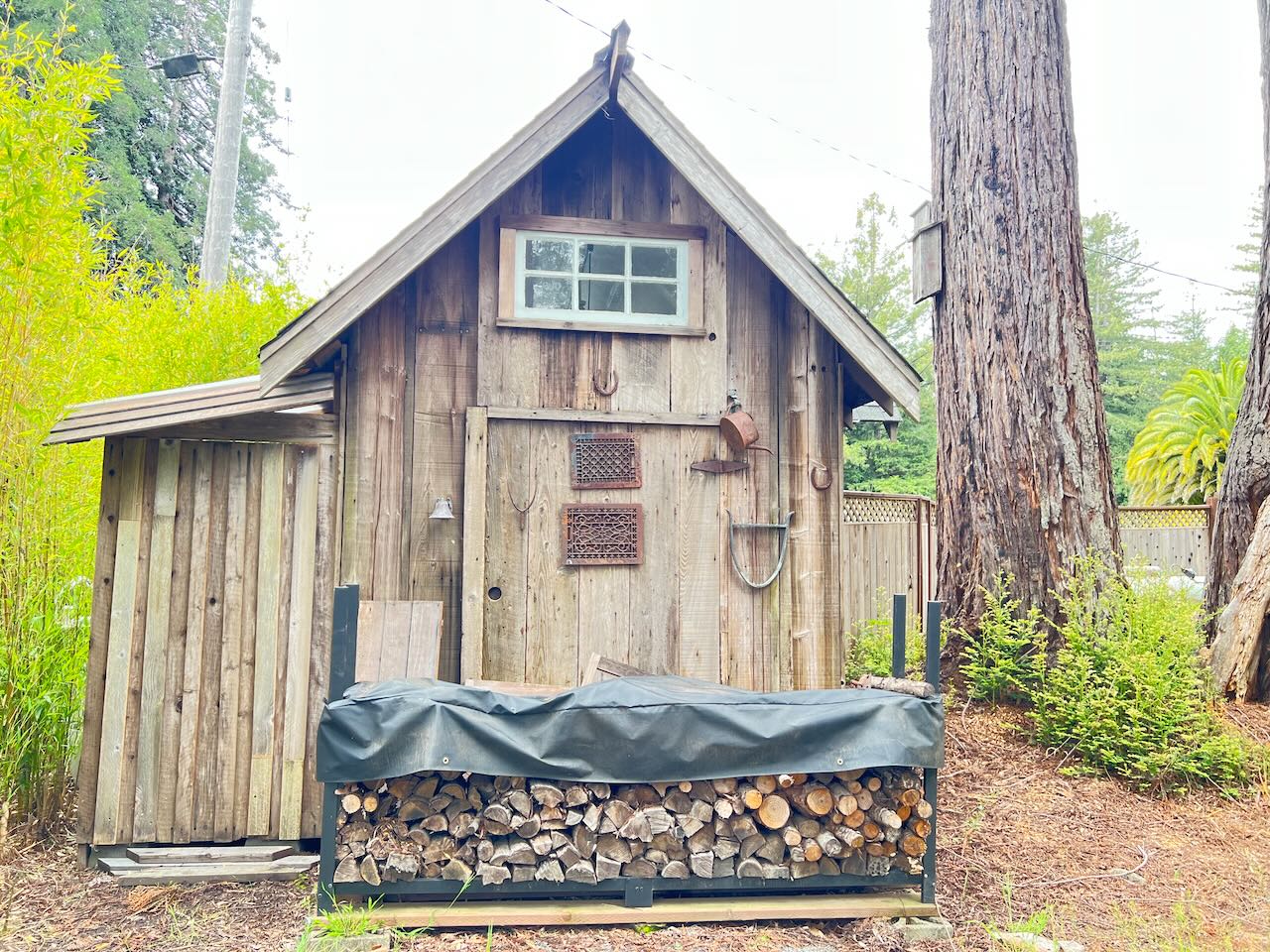 This is the back of The Redwood Nest. The "Back to Nature outhouse/composting toilet" is on the left.
