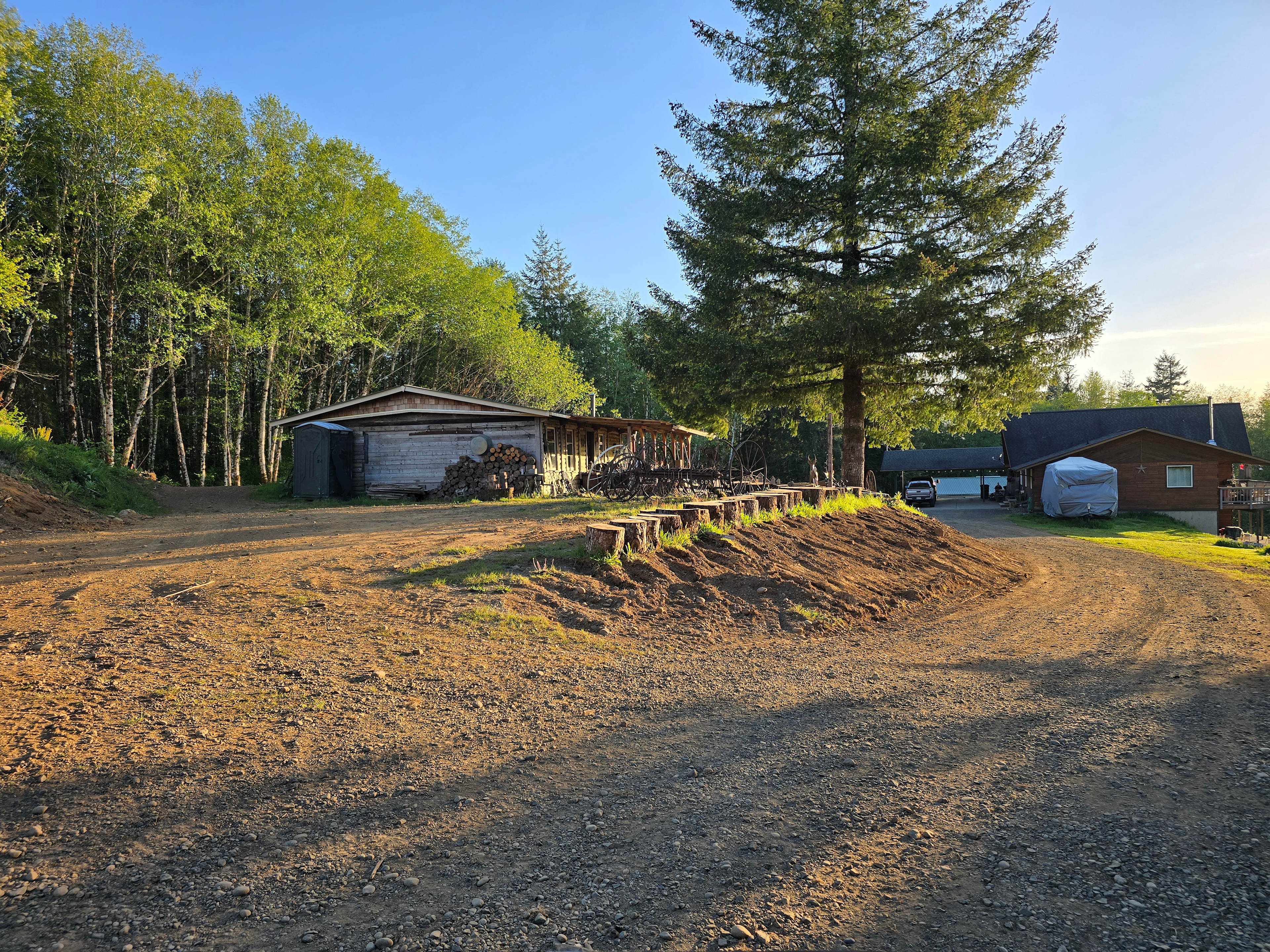 Back in parking for rv beside our rustic saloon. 