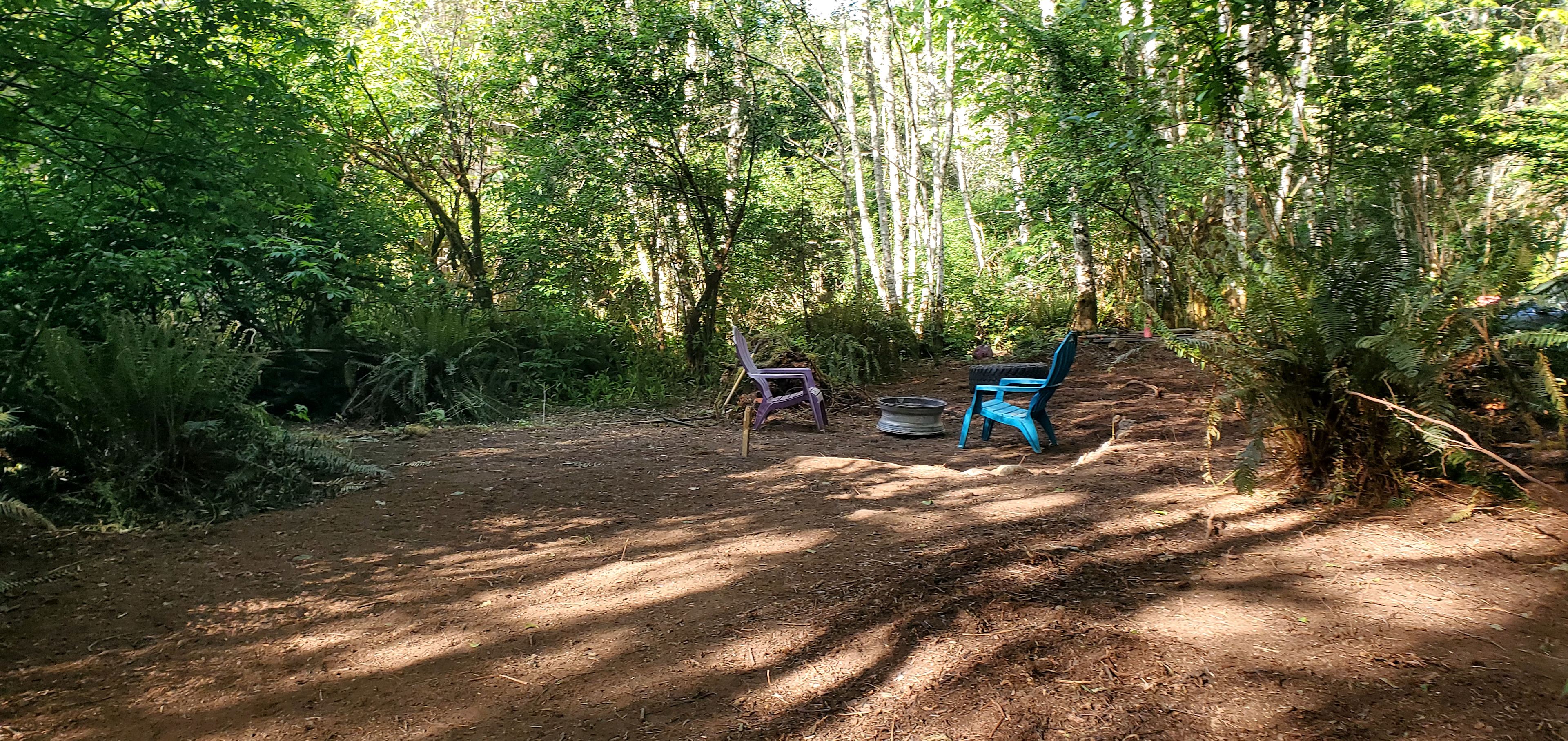 This the main site parking then firepit and picnic table and main tent spot