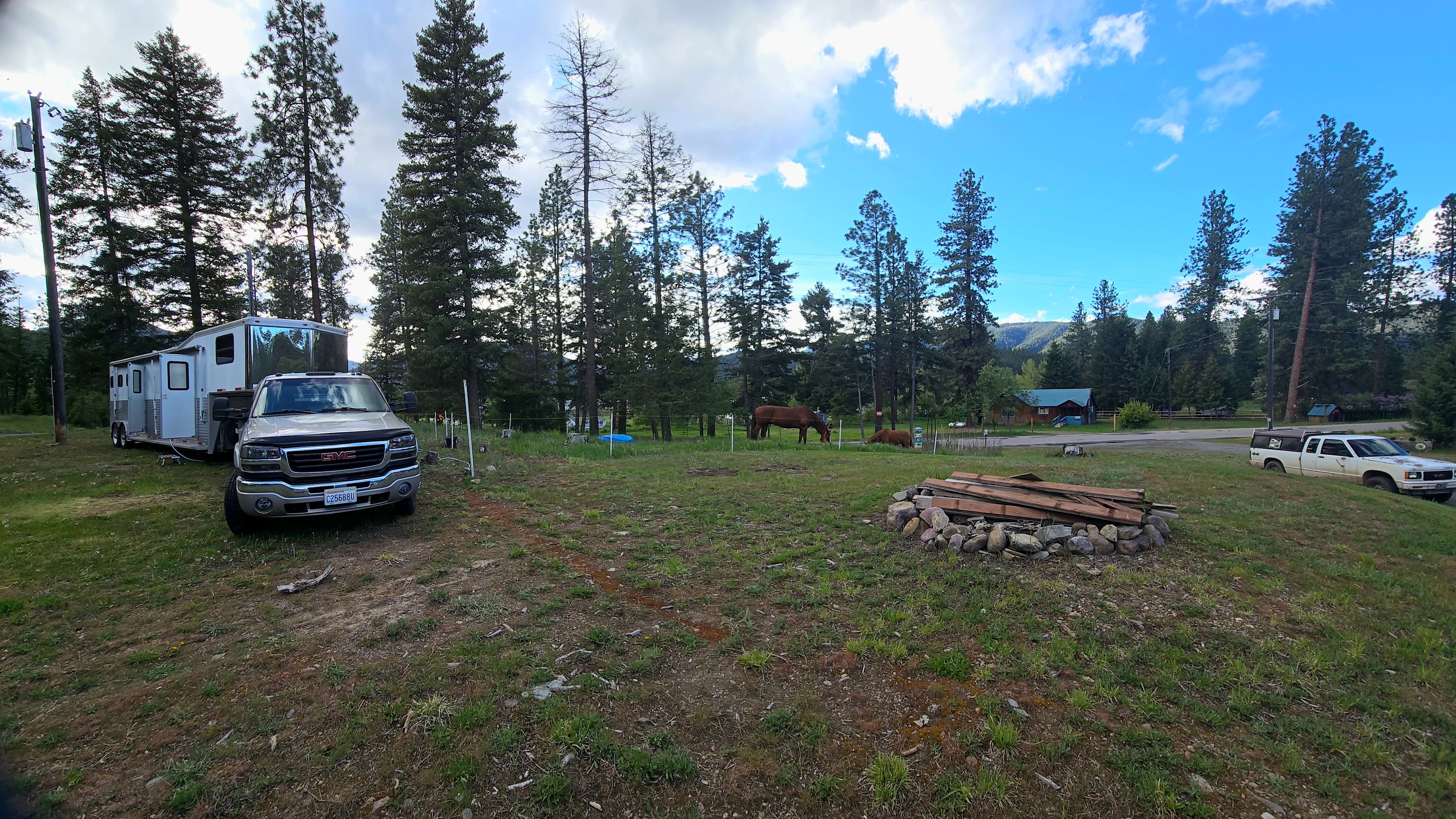 This truck and horse trailer are a total of 35'.  You can see the area where the horses are penned with temporary electric fencing, brought by horse owner.  We do not provide fencing for livestock or dogs.