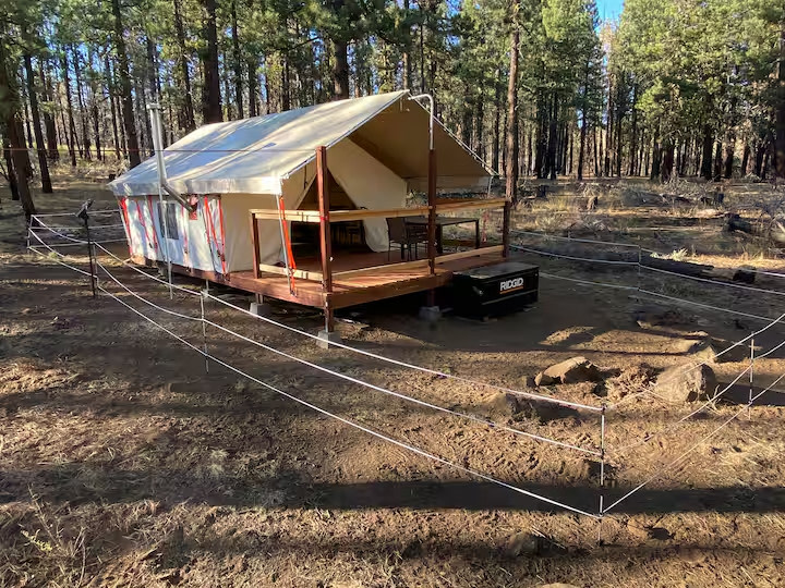 Storage locker for you to put a cooler into (don't feed the bears) plus a solar powered electric fence deters big critters from investigating camp. 