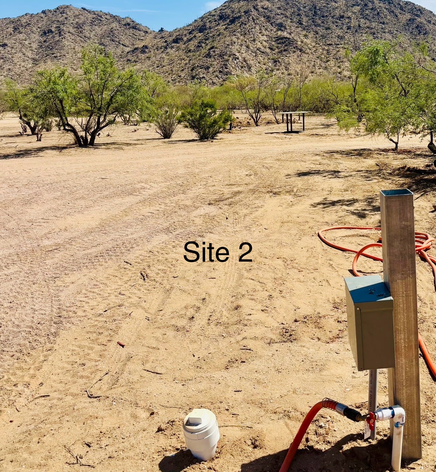 50/30 amp, water and sewer 

This site is for small campers only: 
Camper vans, teardrop, popups less than 20’ (Pull through) 