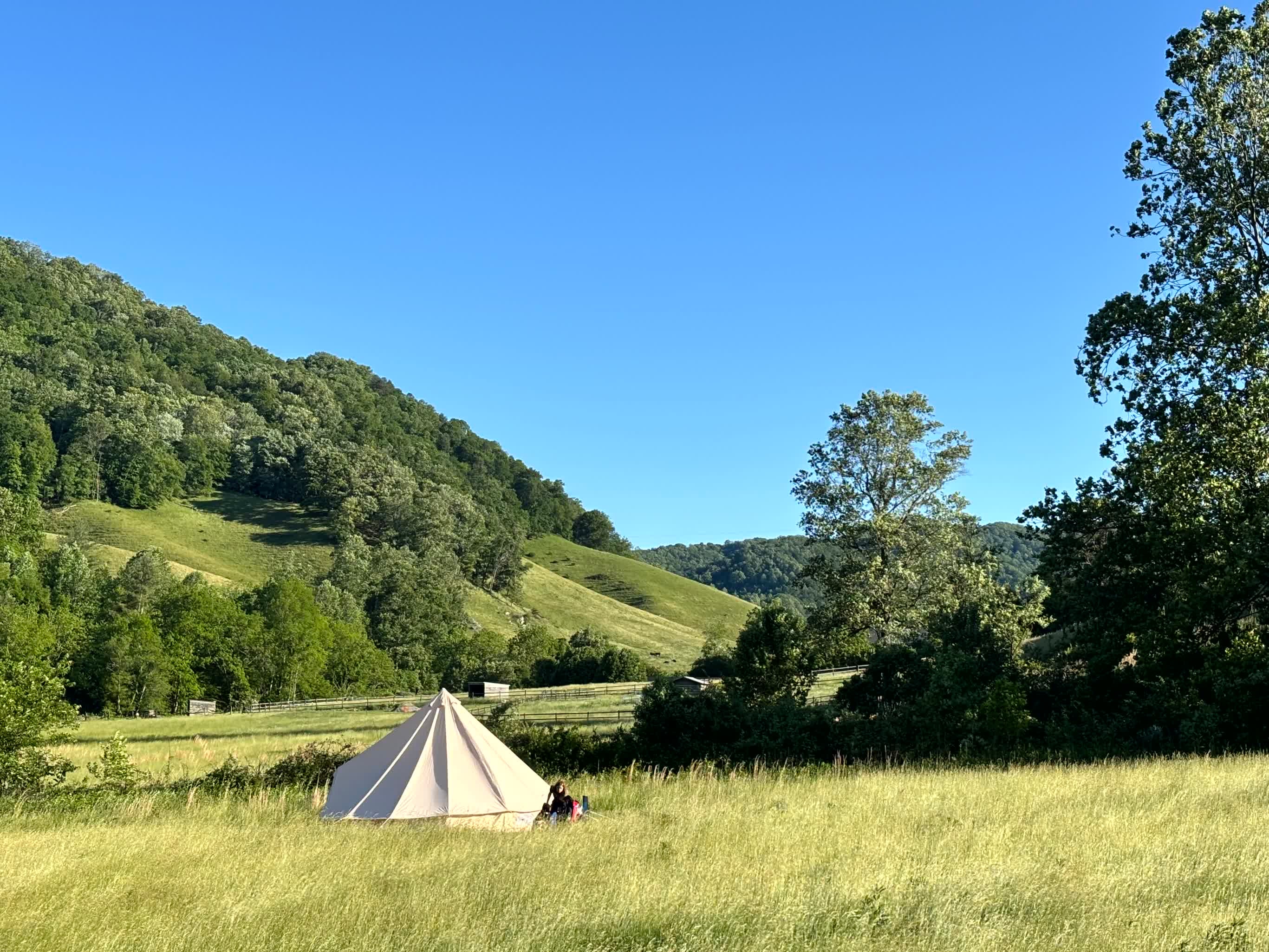Tent site with valley views and fire pit, 100 feet from the creek! Bell tent not included.