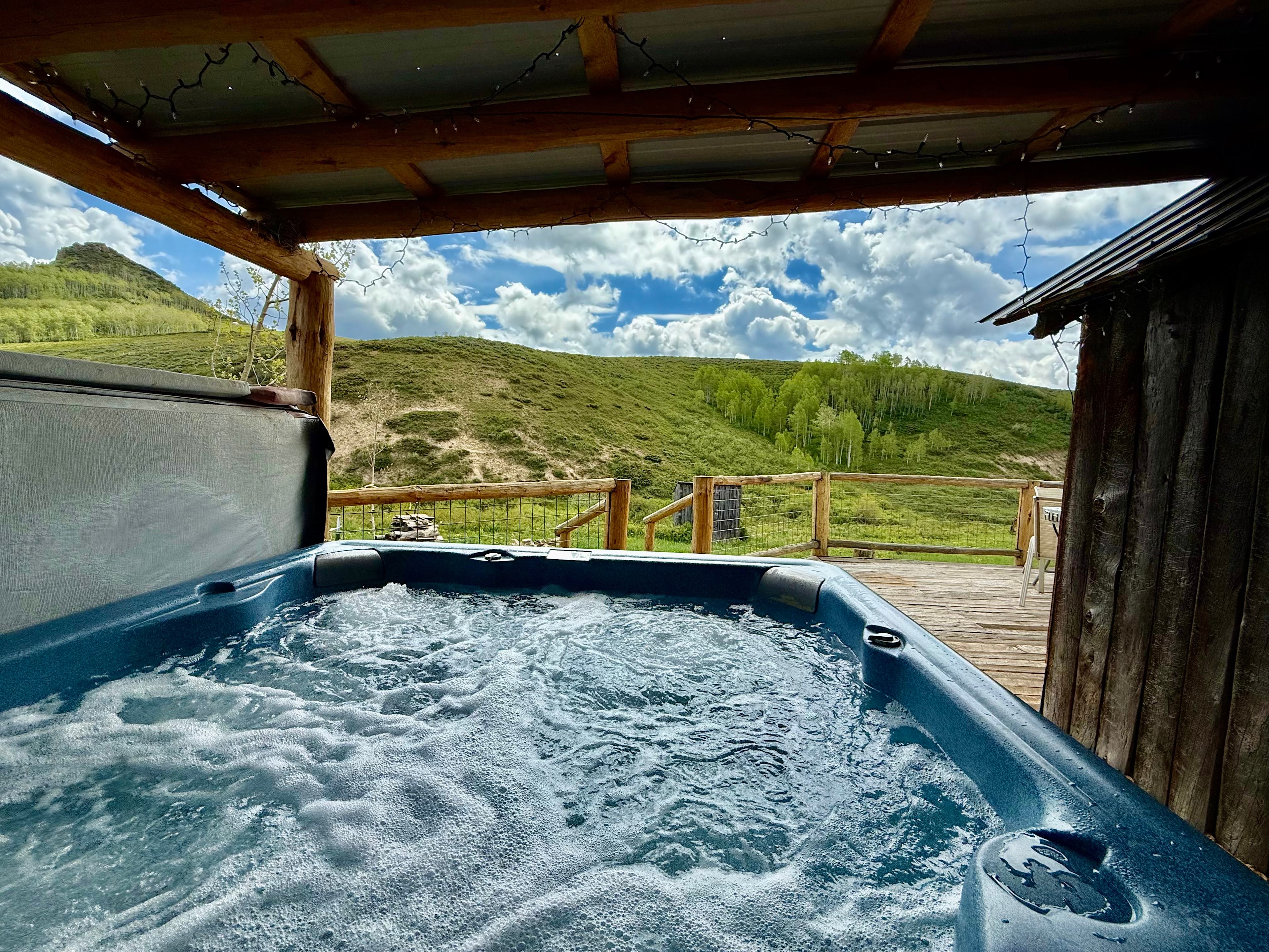 Guests can enjoy a soak in our hot tub after a day of adventures at the shared Hitchin' Post.