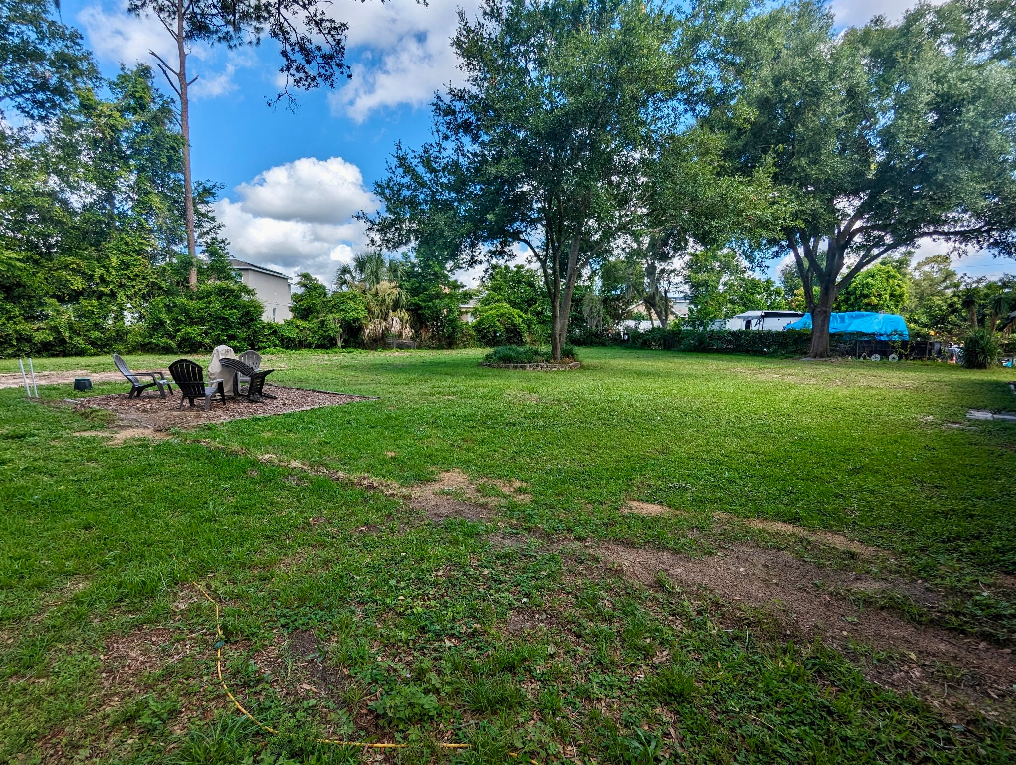  Back yard,  park along back fence or by metal barn on concrete slab
