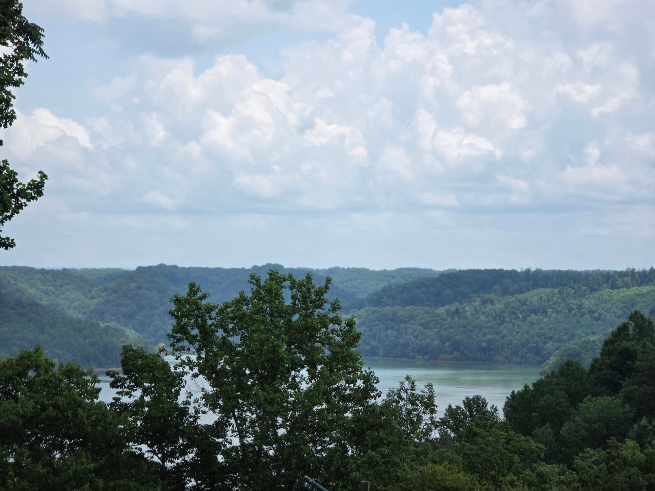 The lake sits 400 ft below the cottage.  Even on a partly cloudy day, the area is welcoming.