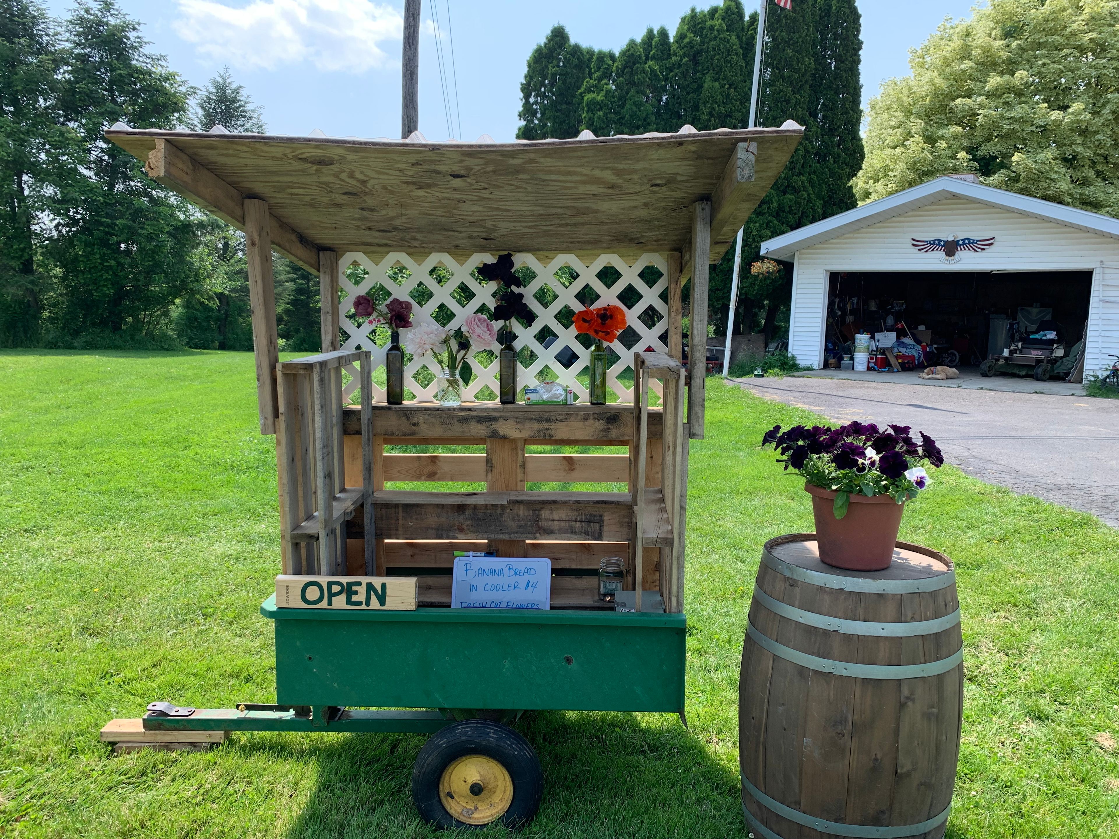Road side stand! Depending on the week we may have strawberry jam, banana bread and mini jar desserts. Once the chickens start laying eggs