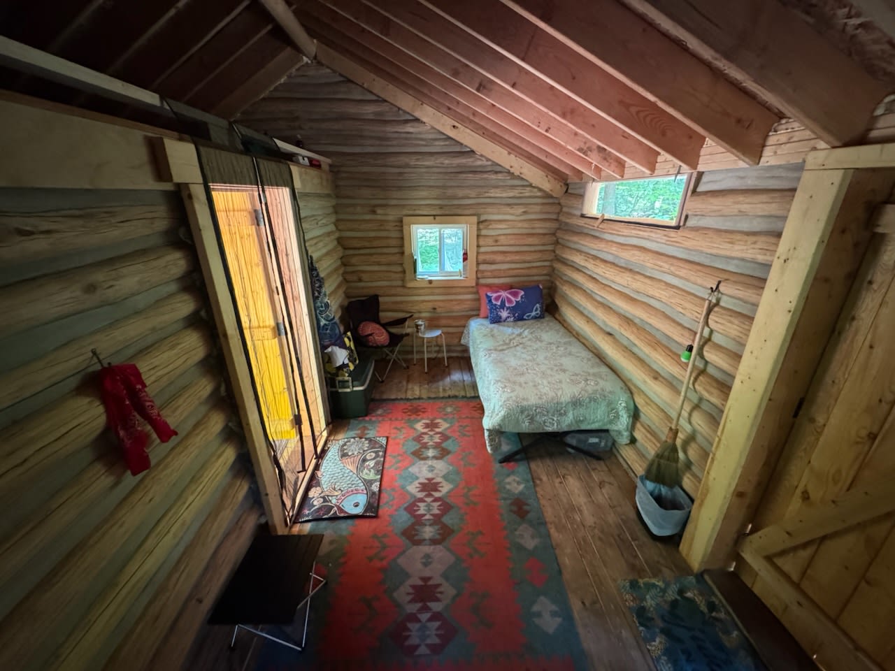 One twin bed setup with an additional cot in cabin and loft above. 