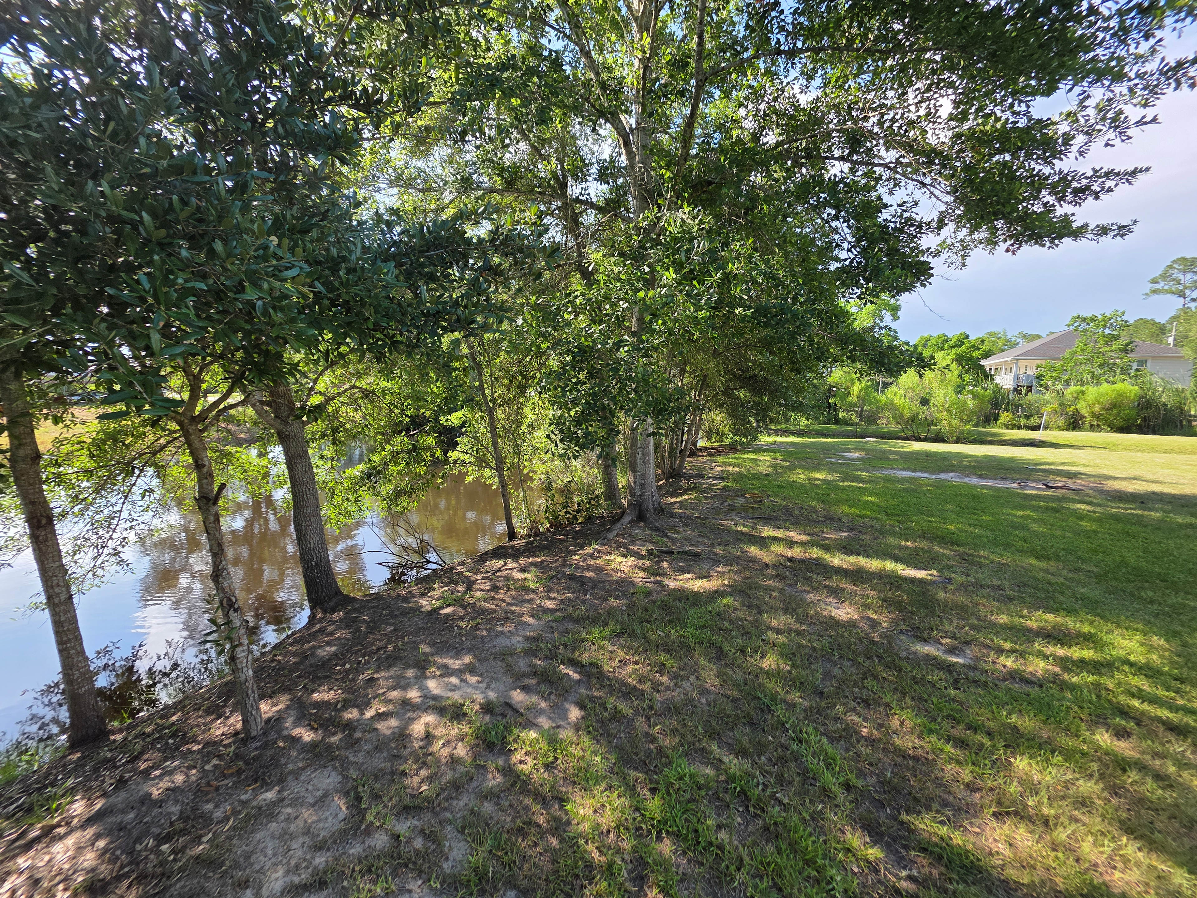 Grass Lot On Canal ➡️ St Louis Bay