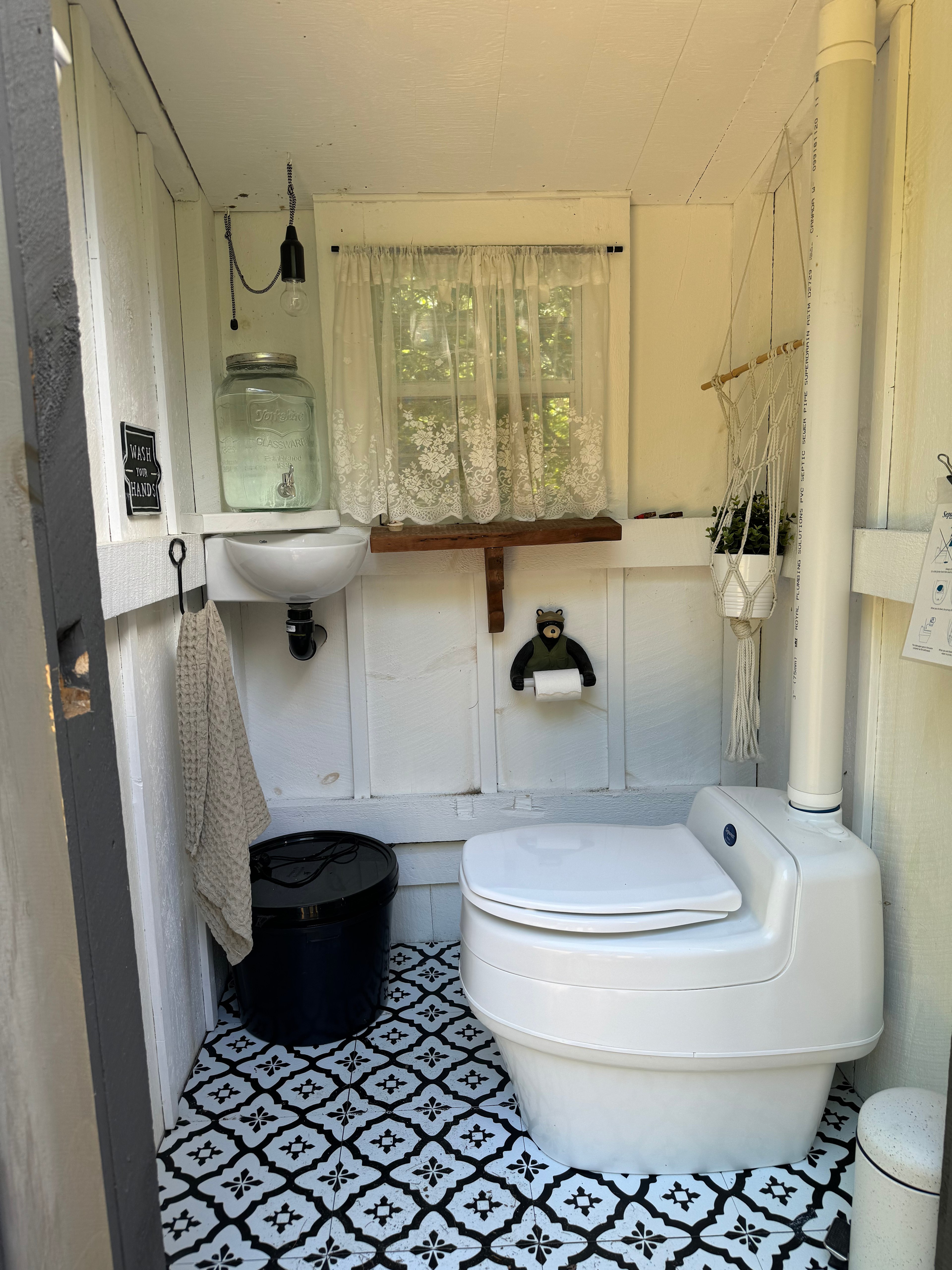 Inside of the outhouse! There is a compostable toilet (with directions!). 