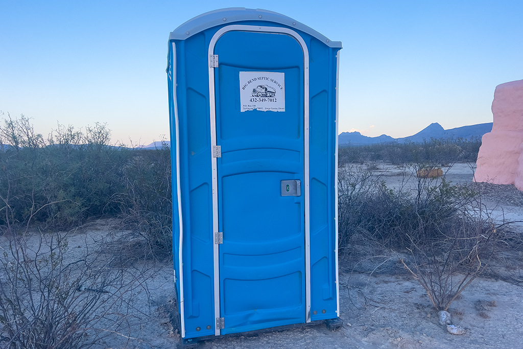A well-kept porta-potty stocked with toilet paper is located just behind the Dome.