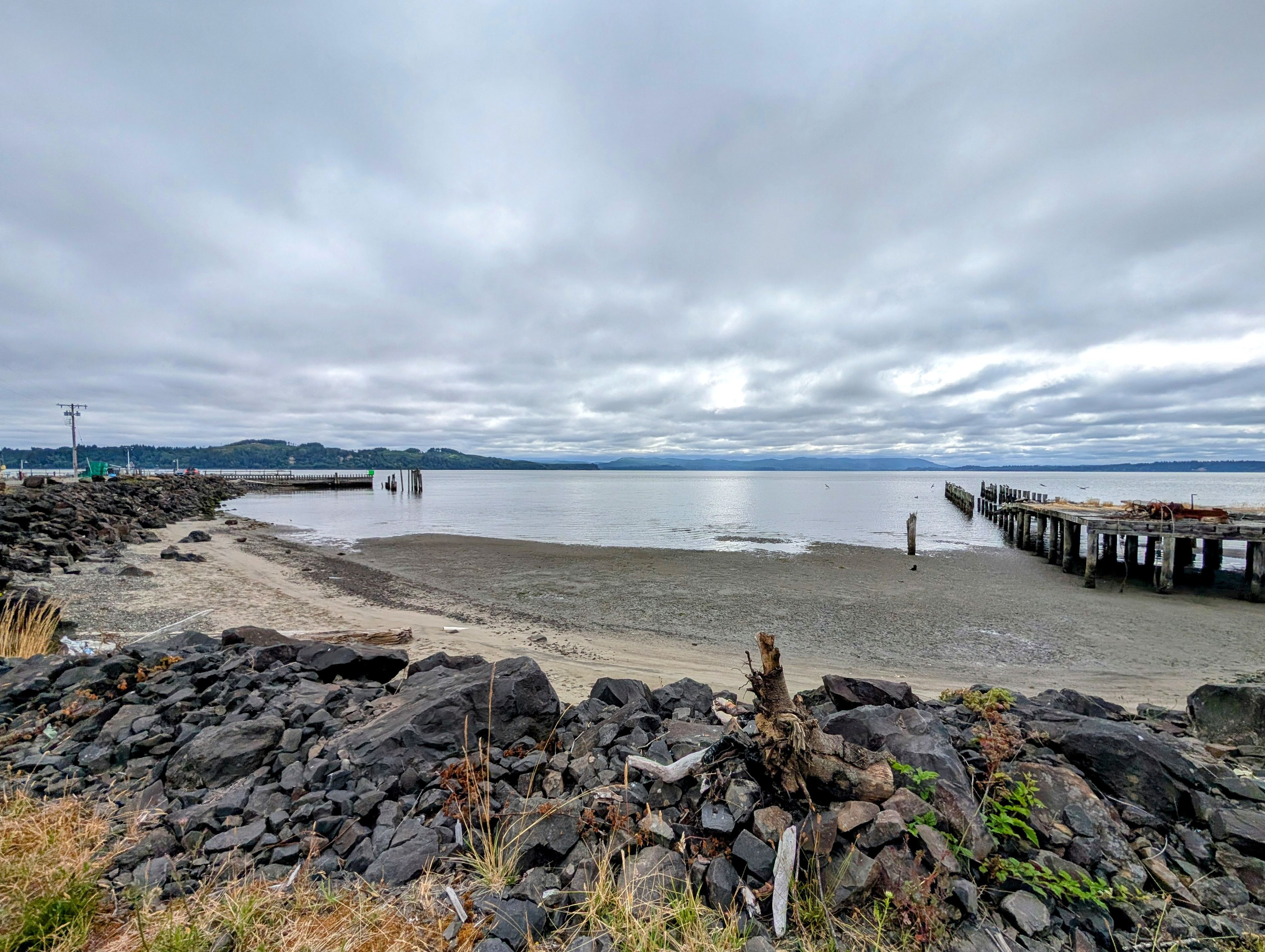 Low tide, we saw beachcombers and clammers out